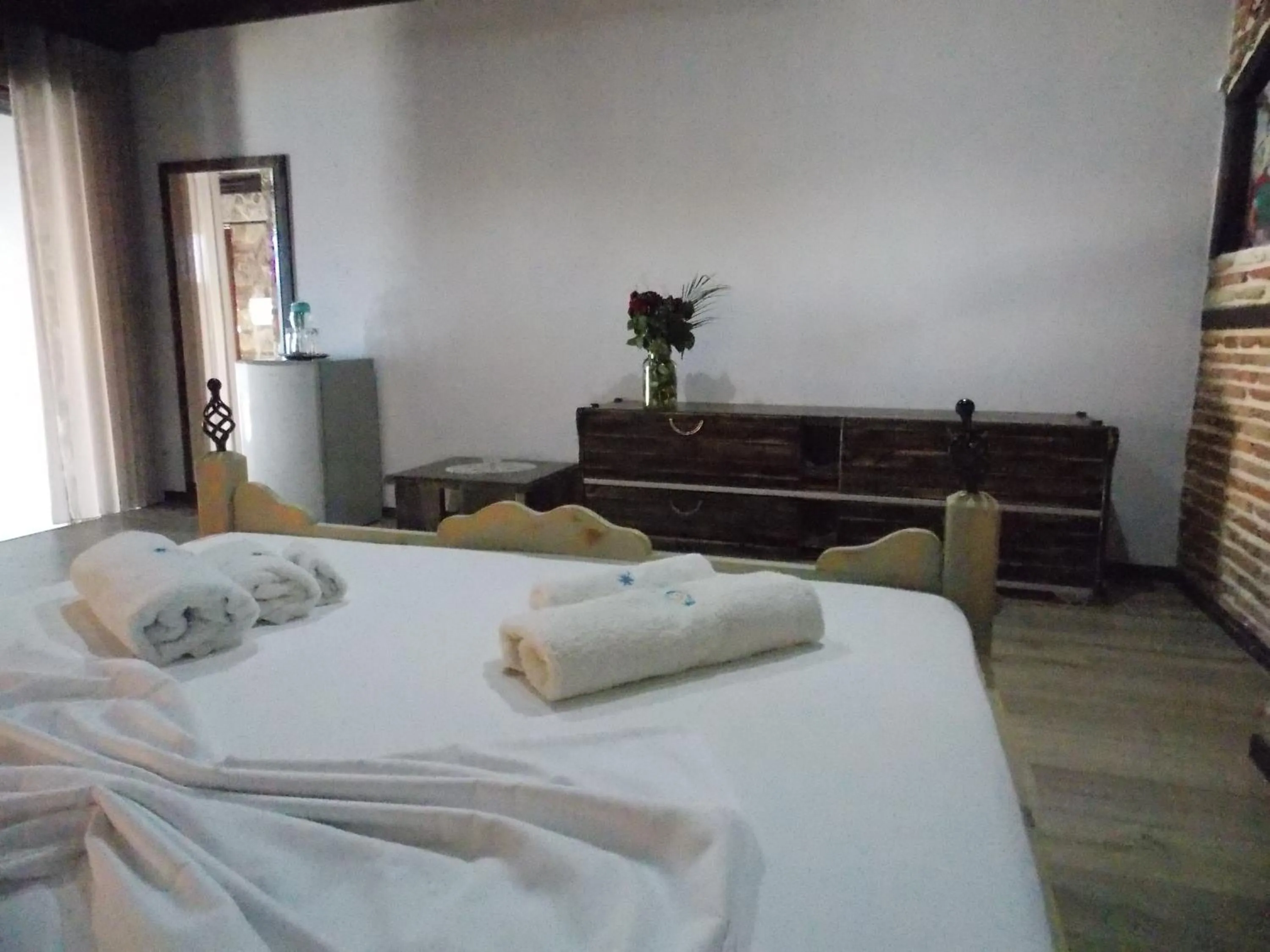 Bed in Sunset Suites