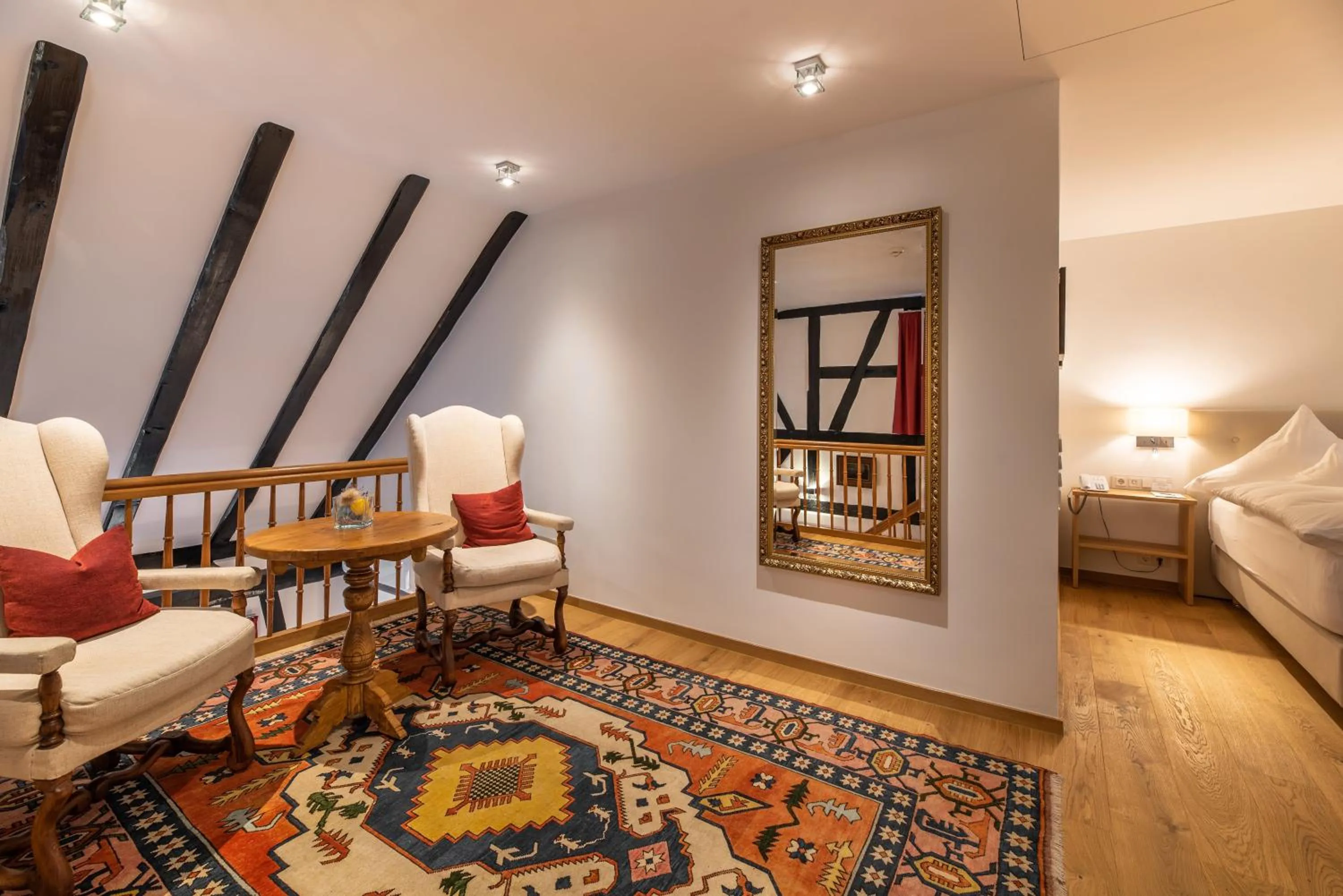 Seating area, Bed in Neumühle Resort & Spa