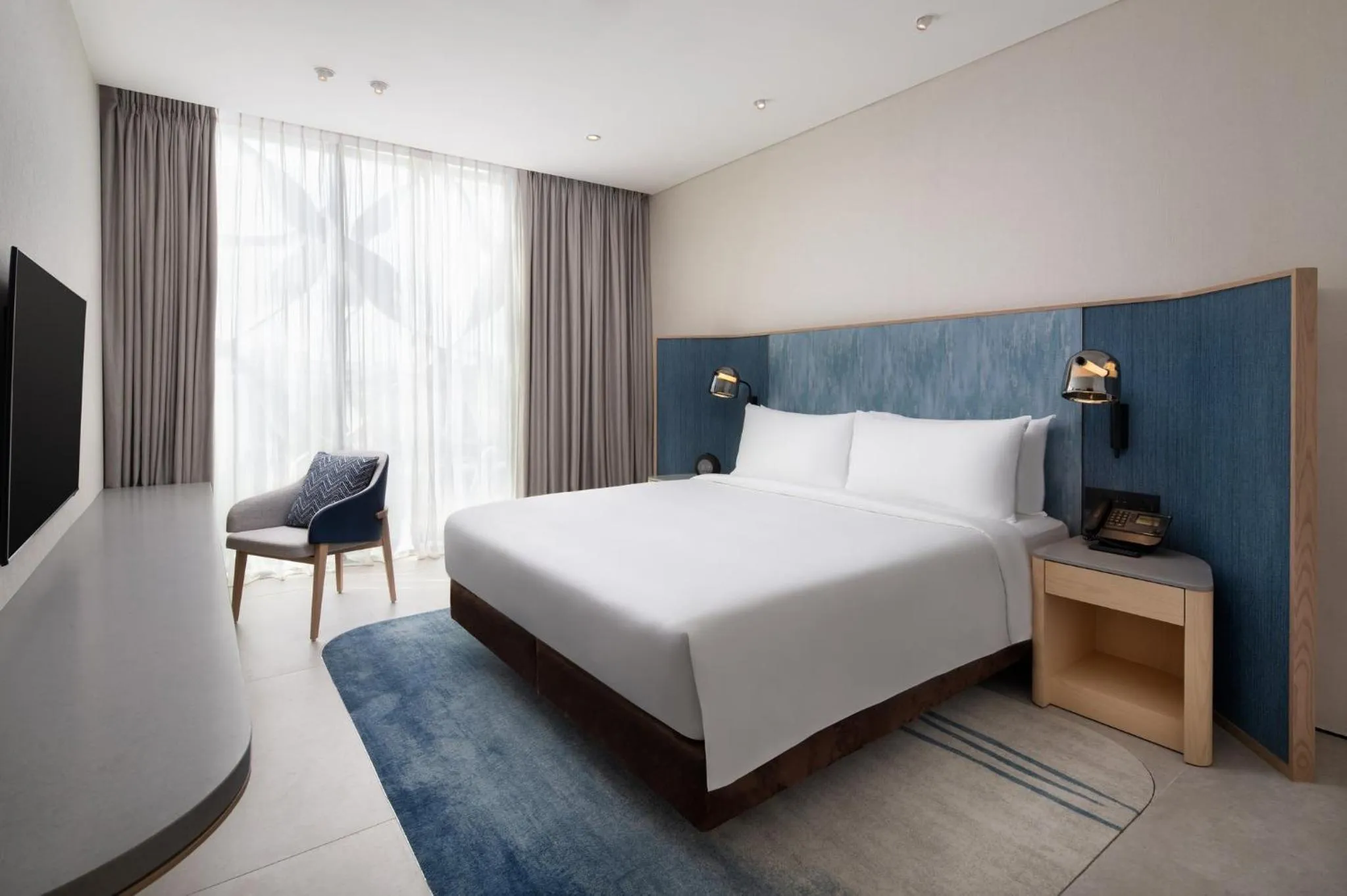 Photo of the whole room, Bed in Crowne Plaza Changi Airport by IHG