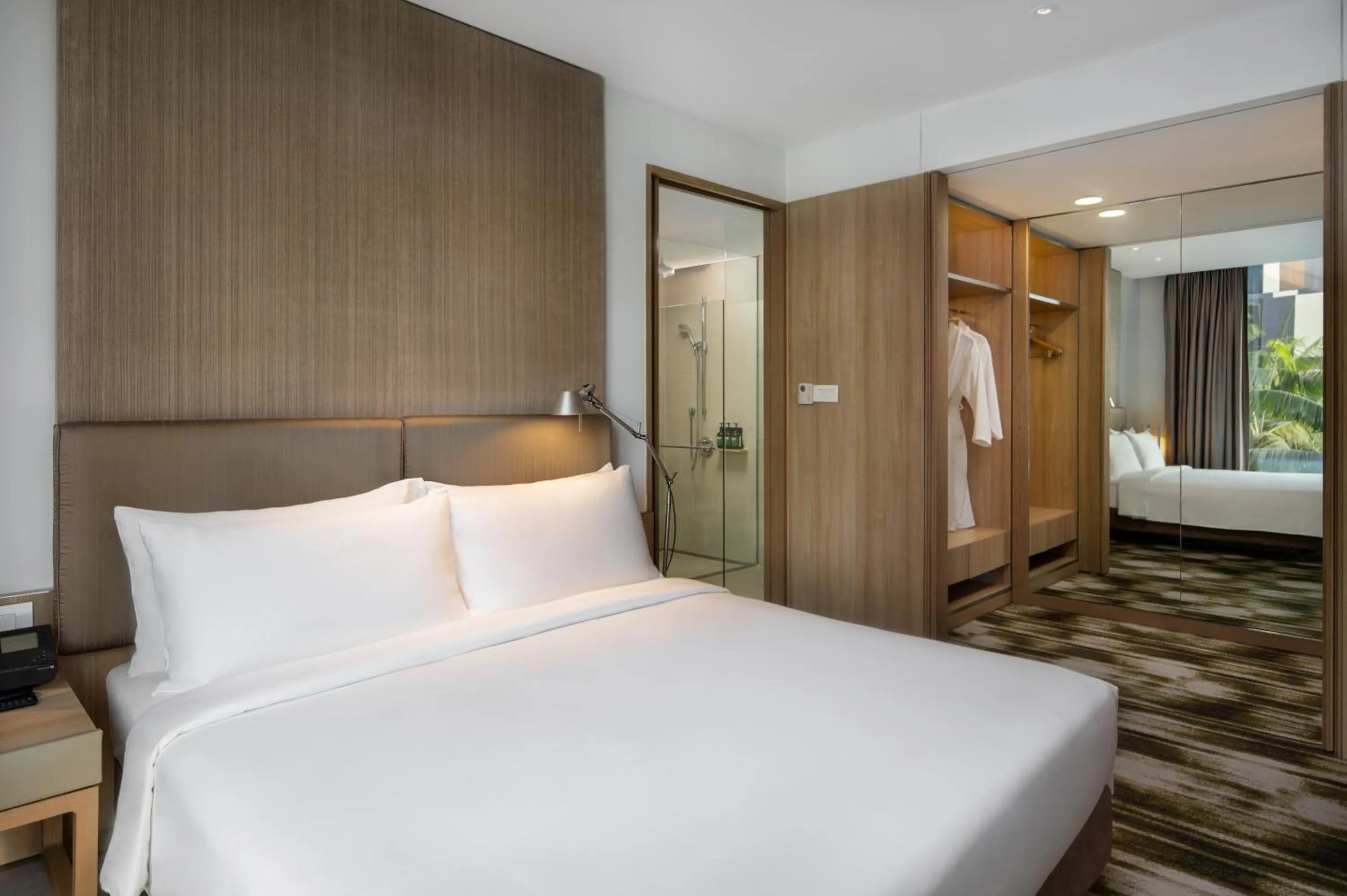 Bed in Crowne Plaza Changi Airport by IHG