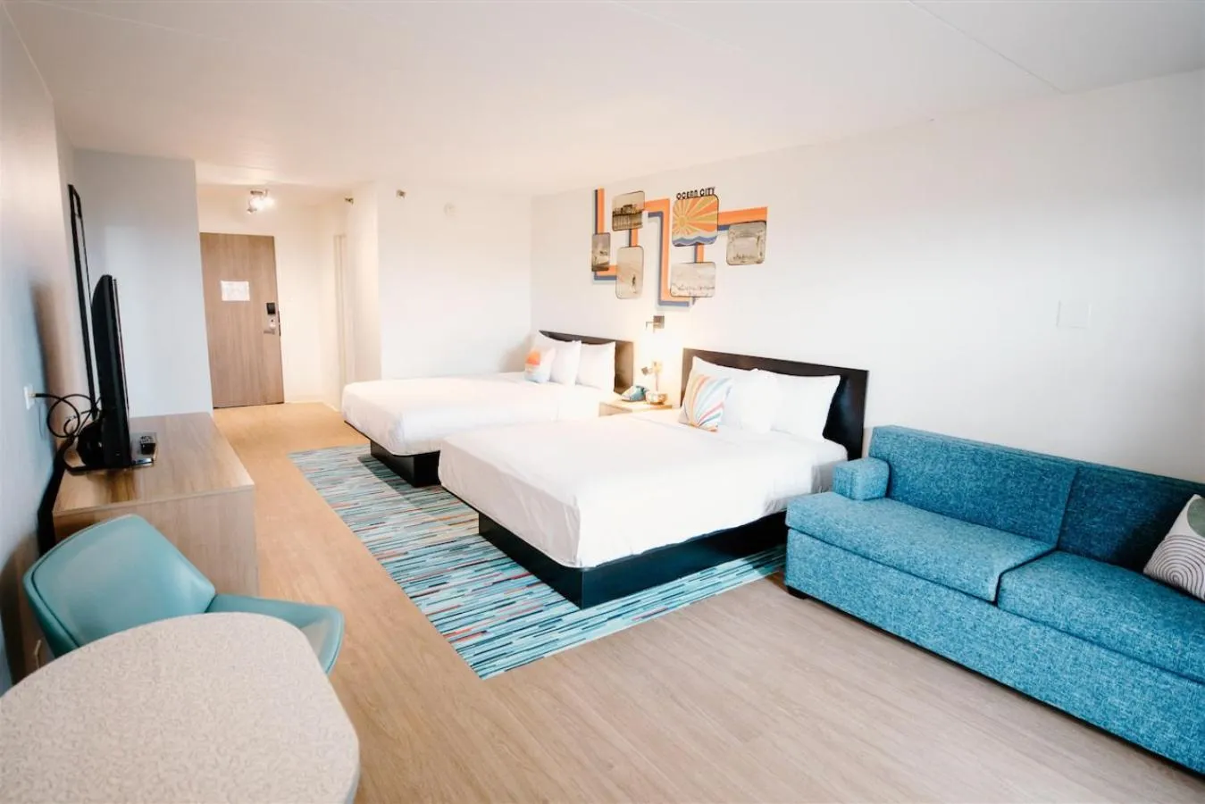 Bed in SeaLoft Oceanfront Hotel