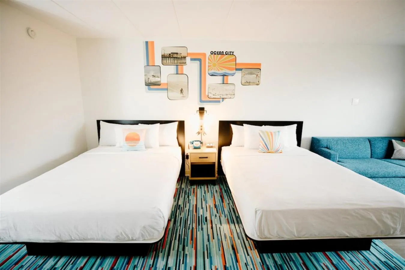 Bed in SeaLoft Oceanfront Hotel