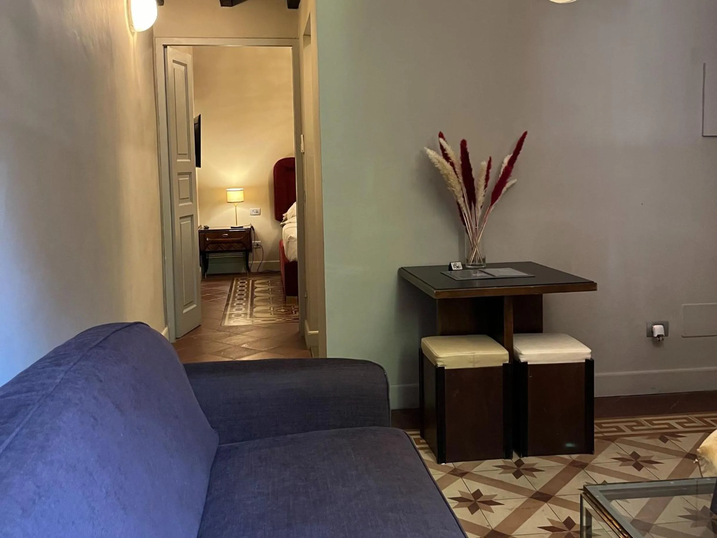 Seating area, Bed in Numa Florence Palazzo San Niccolò