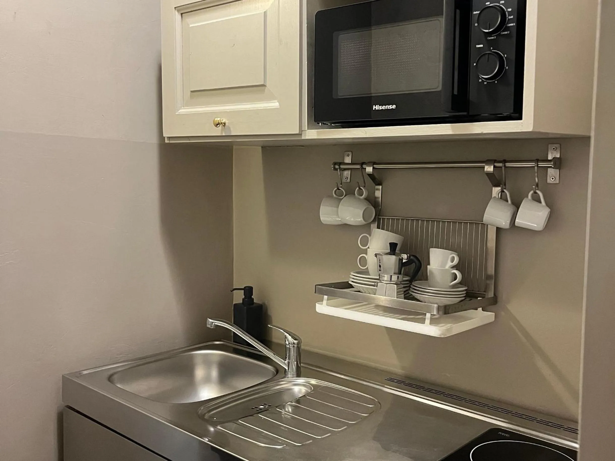 Kitchen or kitchenette in Numa Florence Palazzo San Niccolò