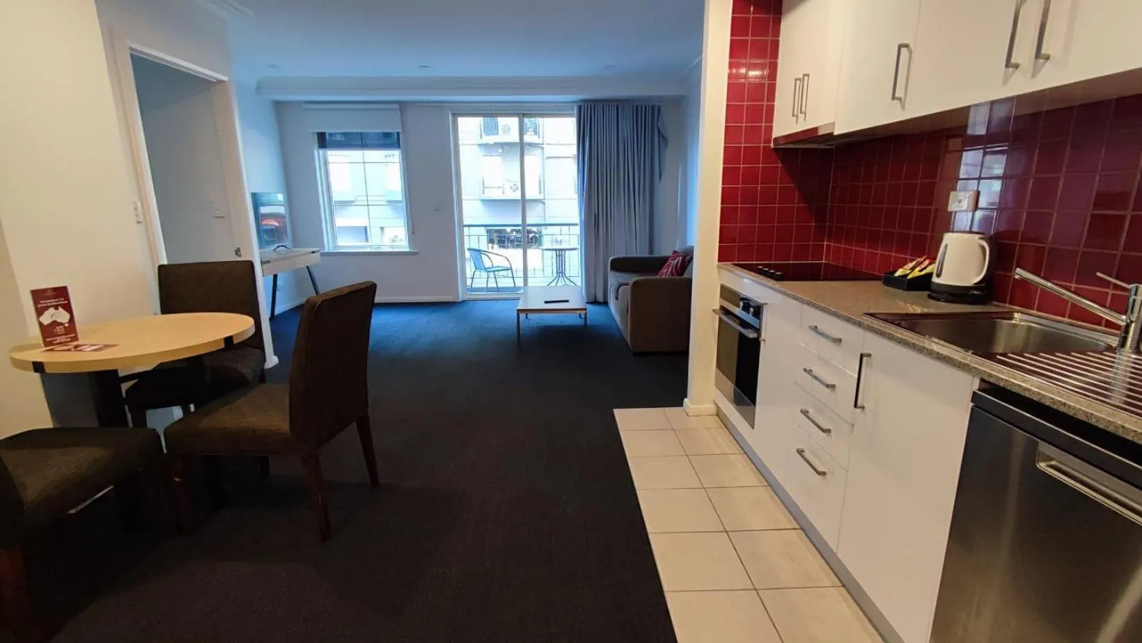 Kitchen or kitchenette in South Yarra Central Apartment Hotel