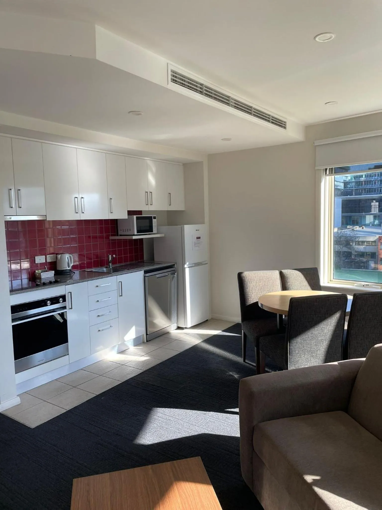 Kitchen or kitchenette in South Yarra Central Apartment Hotel