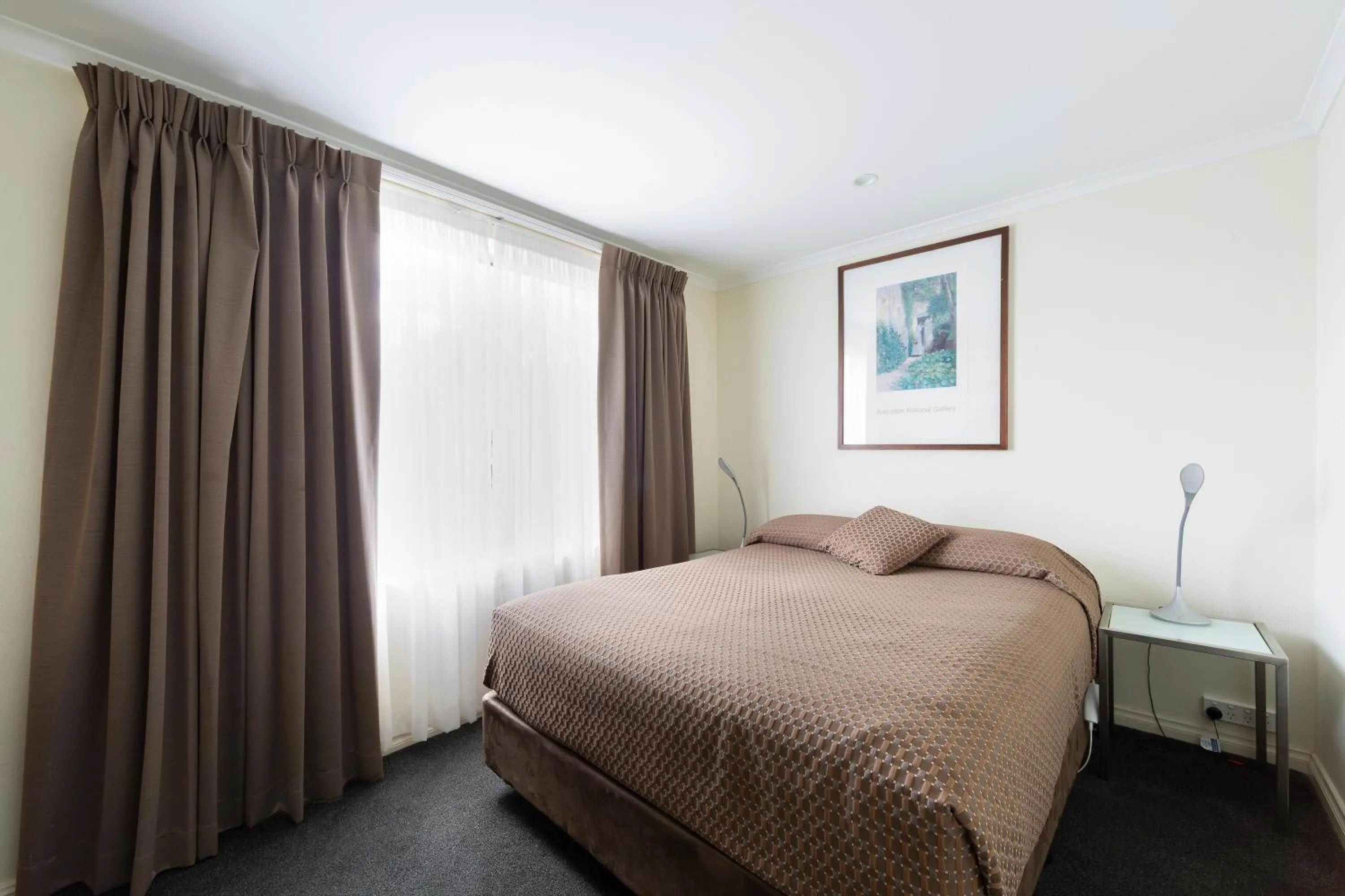 Bed in Forrest Hotel & Apartments