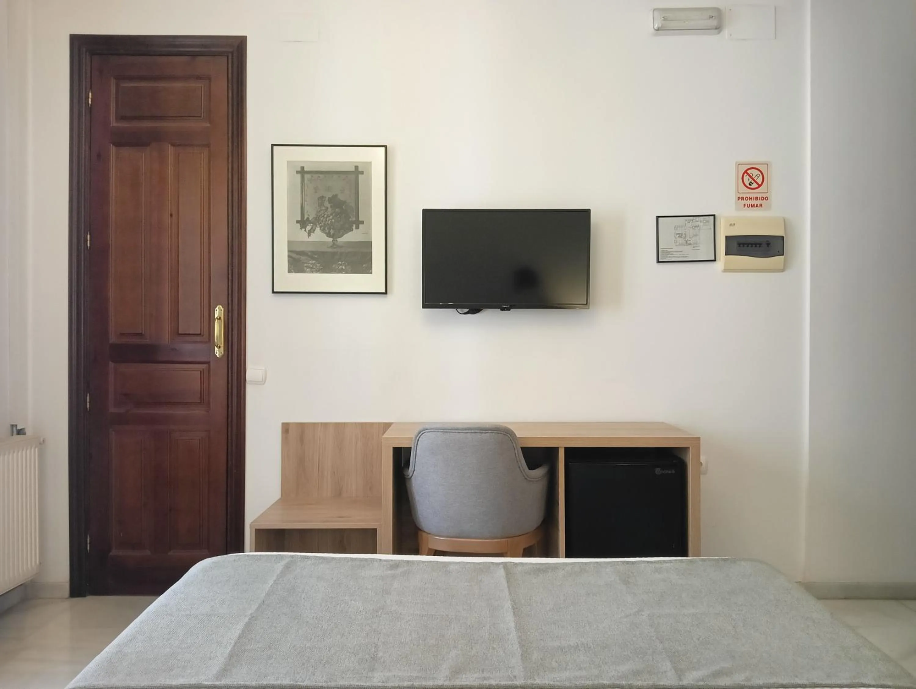 Communal lounge/ TV room, Bed in Don Paula