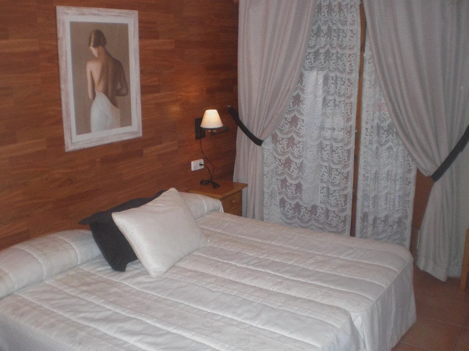 Photo of the whole room, Bed in Roch Hotel
