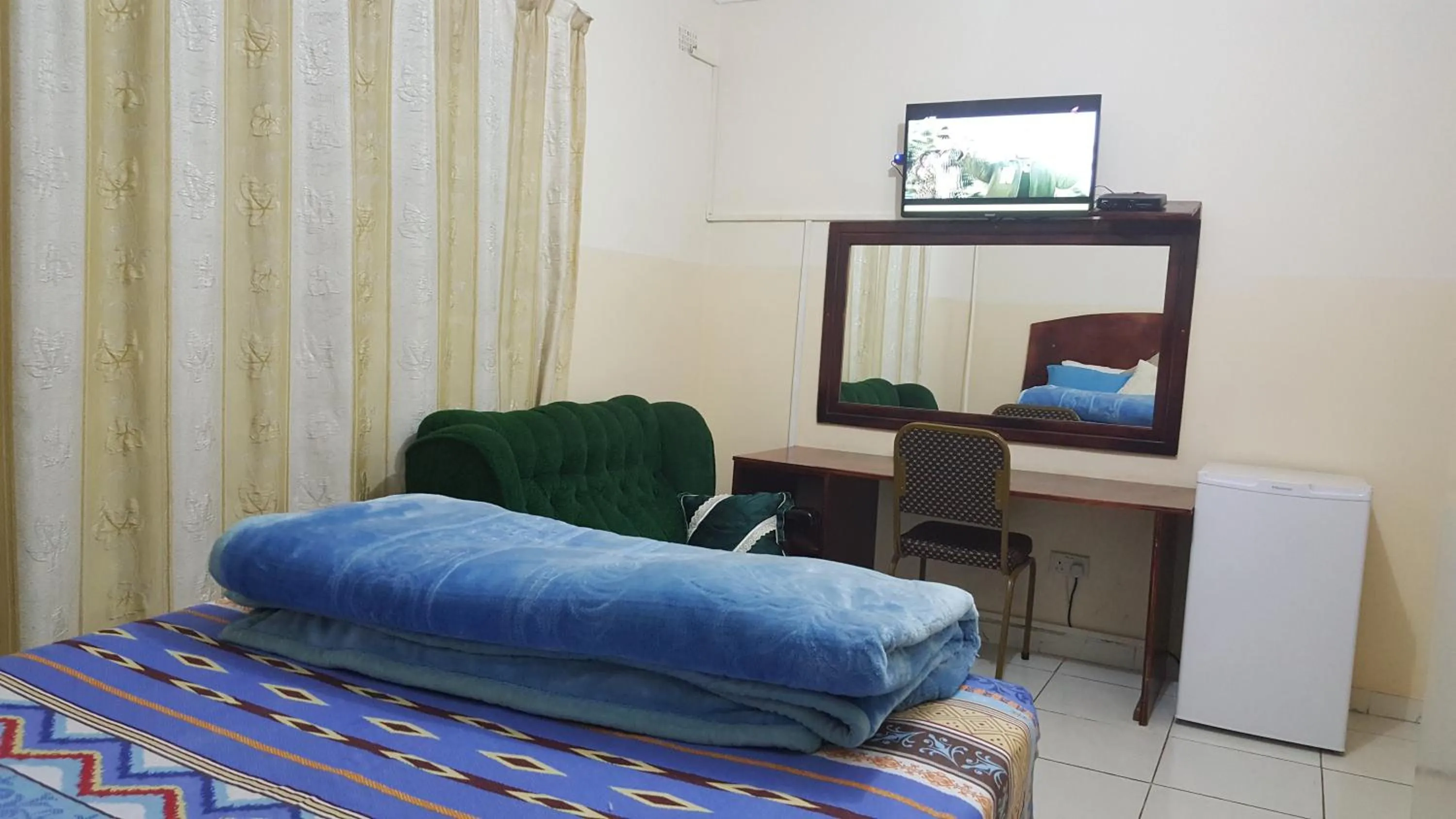 Bed in The Palace Guest House