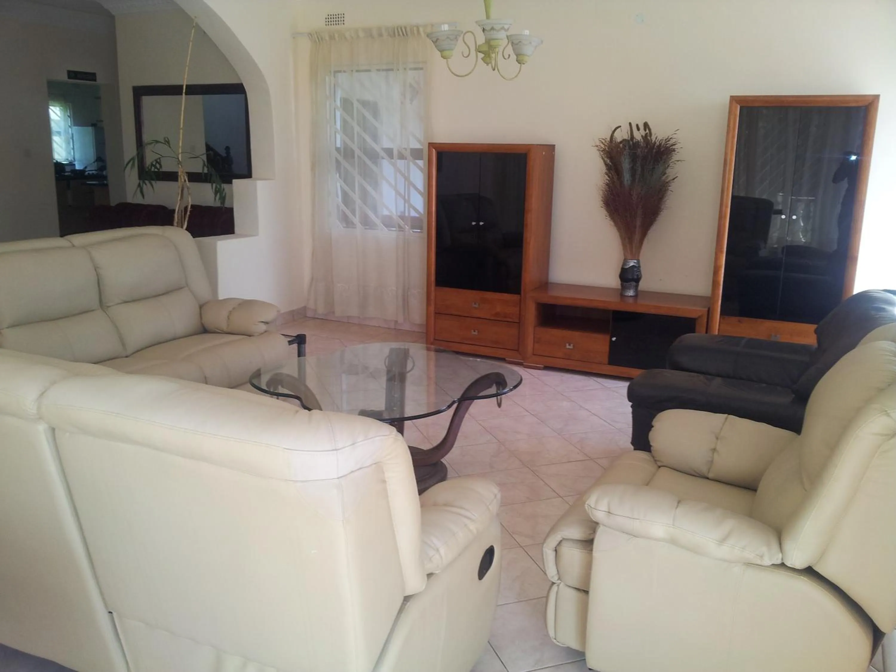 Communal lounge/ TV room in The Palace Guest House