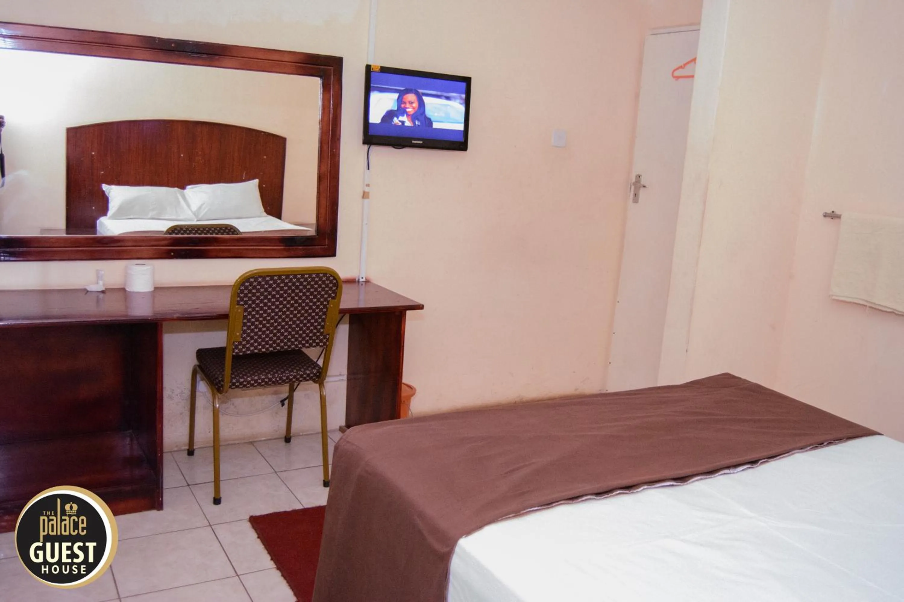 Bed in The Palace Guest House