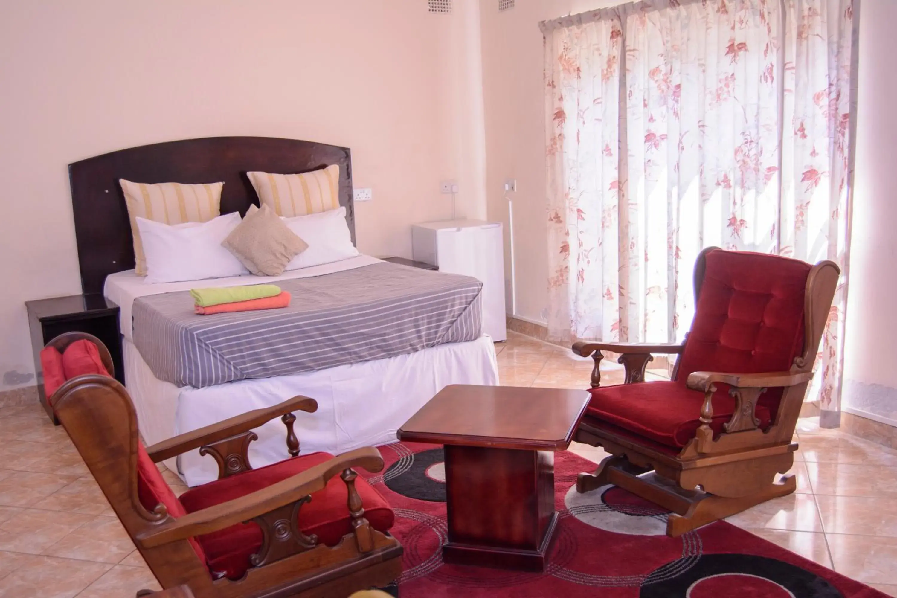 Deluxe Room (2 Adults + 1 Child) in The Palace Guest House Deluxe Room (2 Adults + 1 Child) in The Palace Guest House