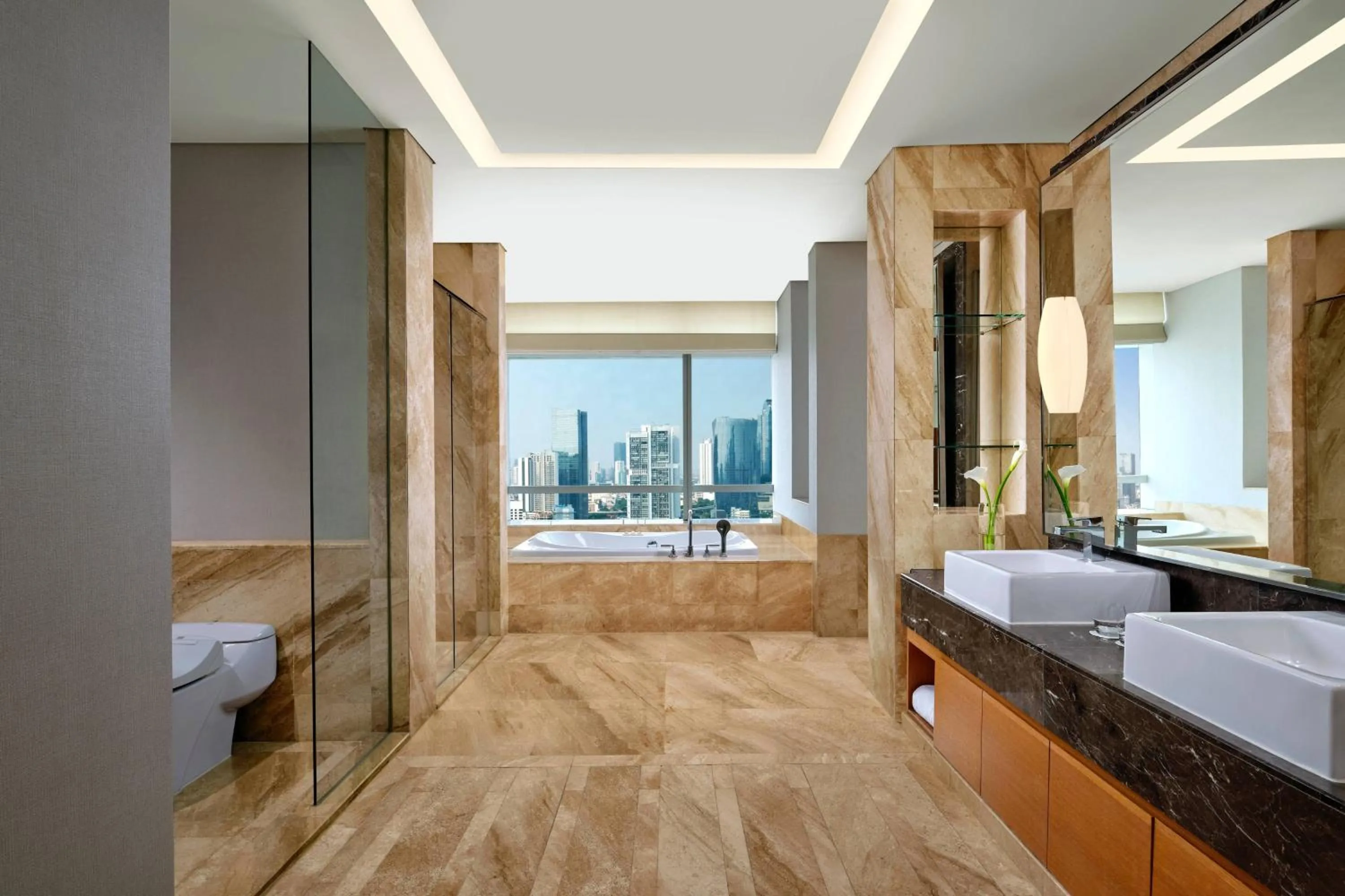 Bathroom, Bed in The Ritz-Carlton Jakarta, Pacific Place