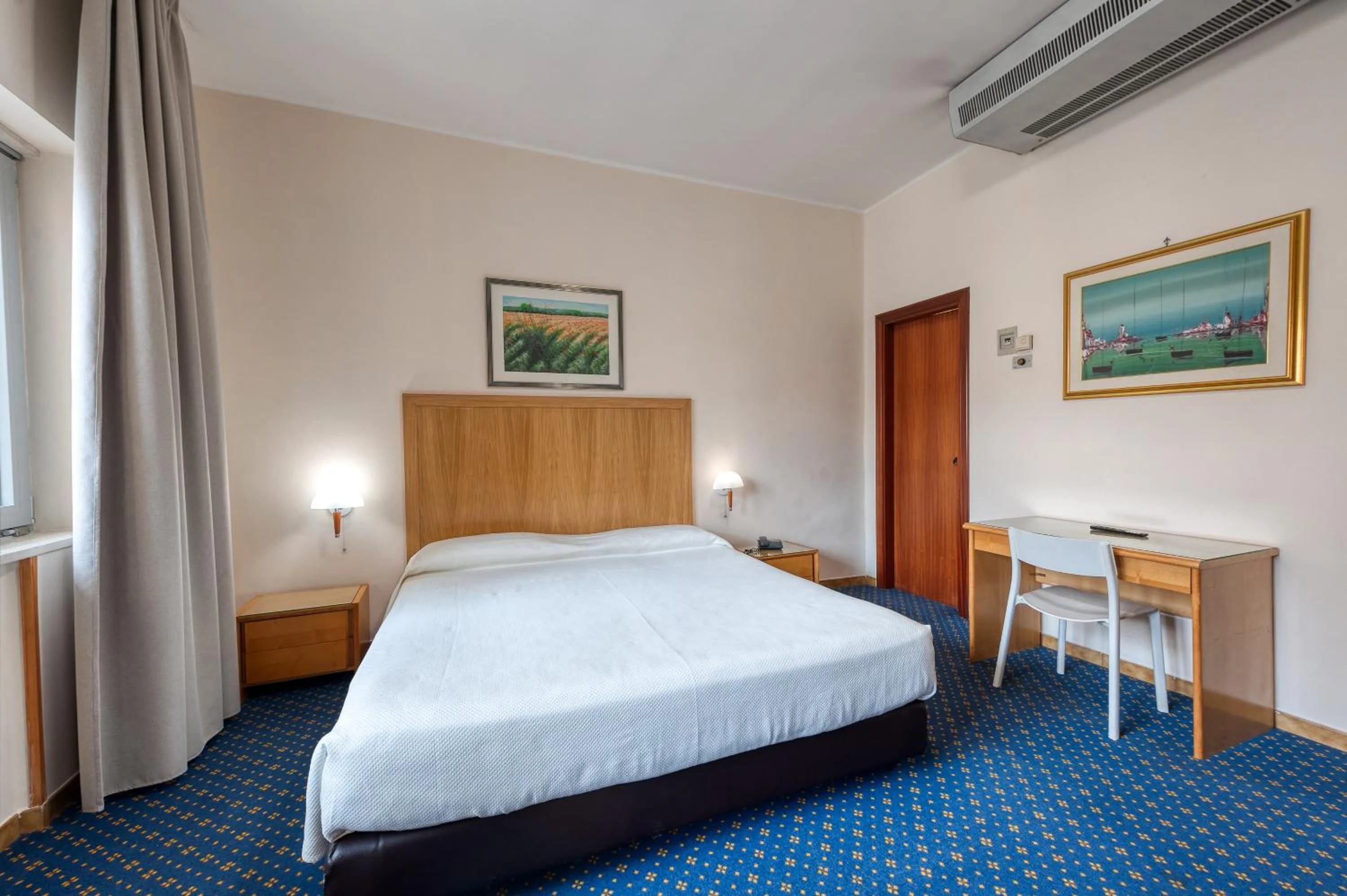 Bed in Hotel Barsotti