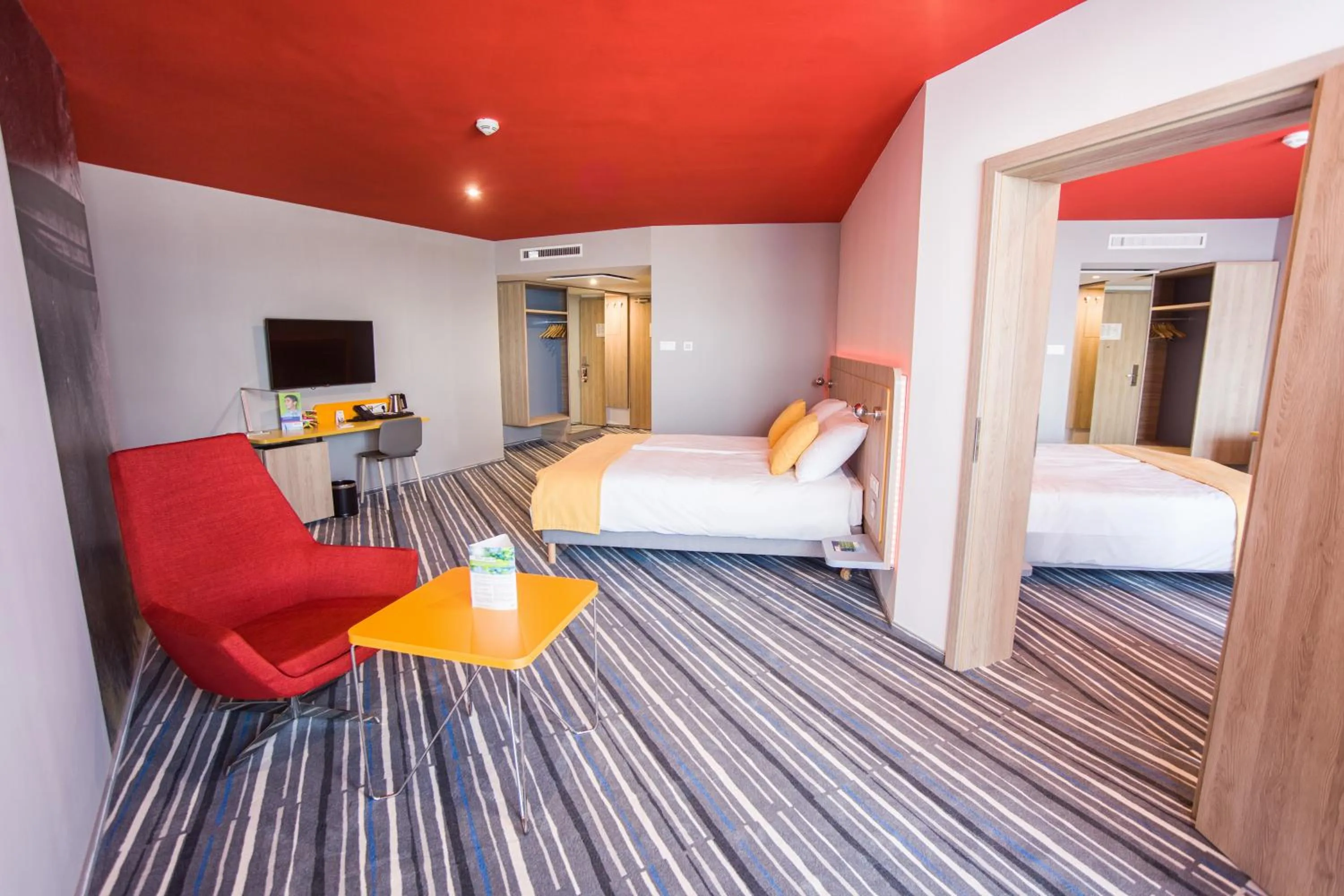 Living room, Bed in Park Inn by Radisson Zalakaros Hotel & Spa - All inclusive