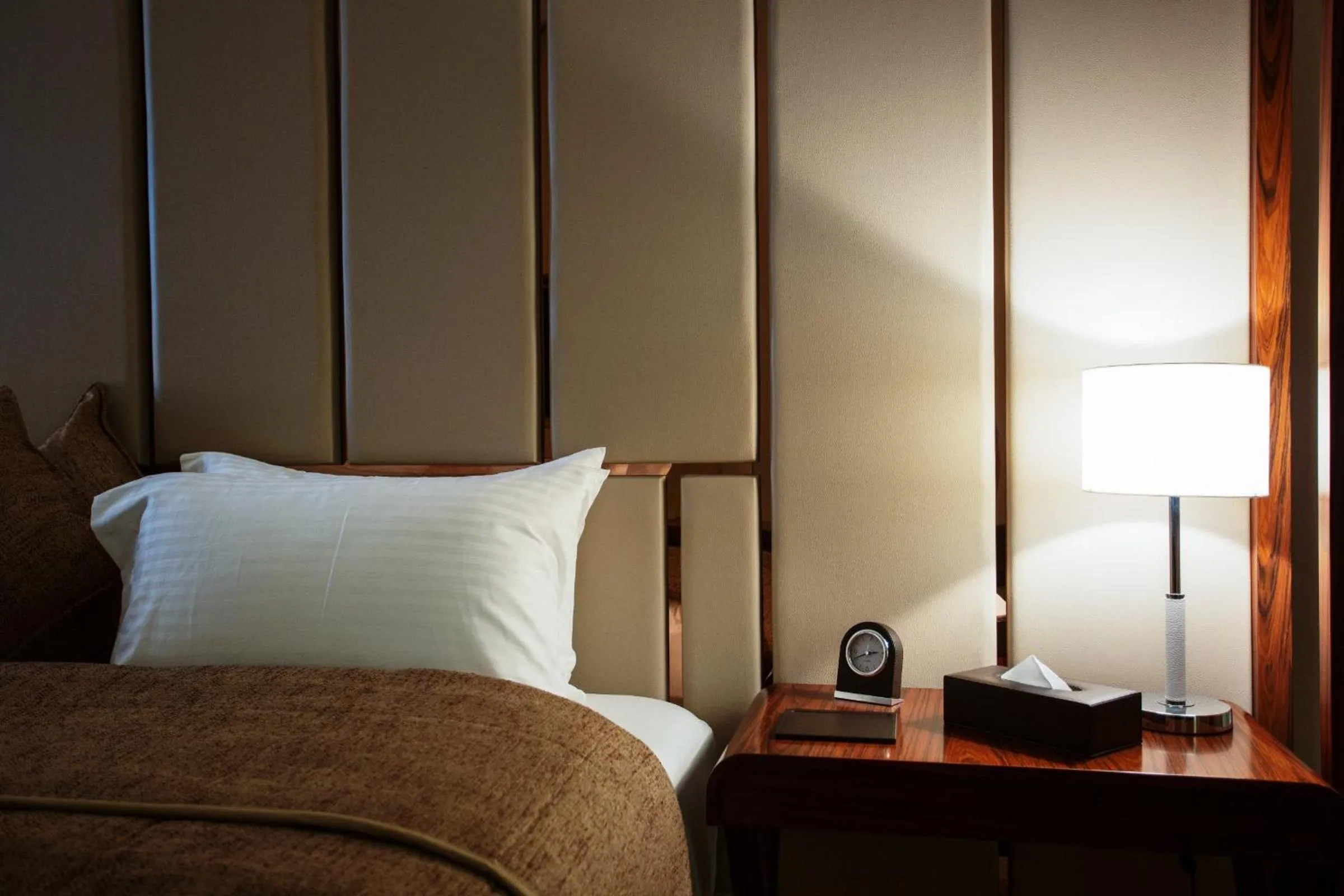 Bed in The Rooms Boutique Hotel