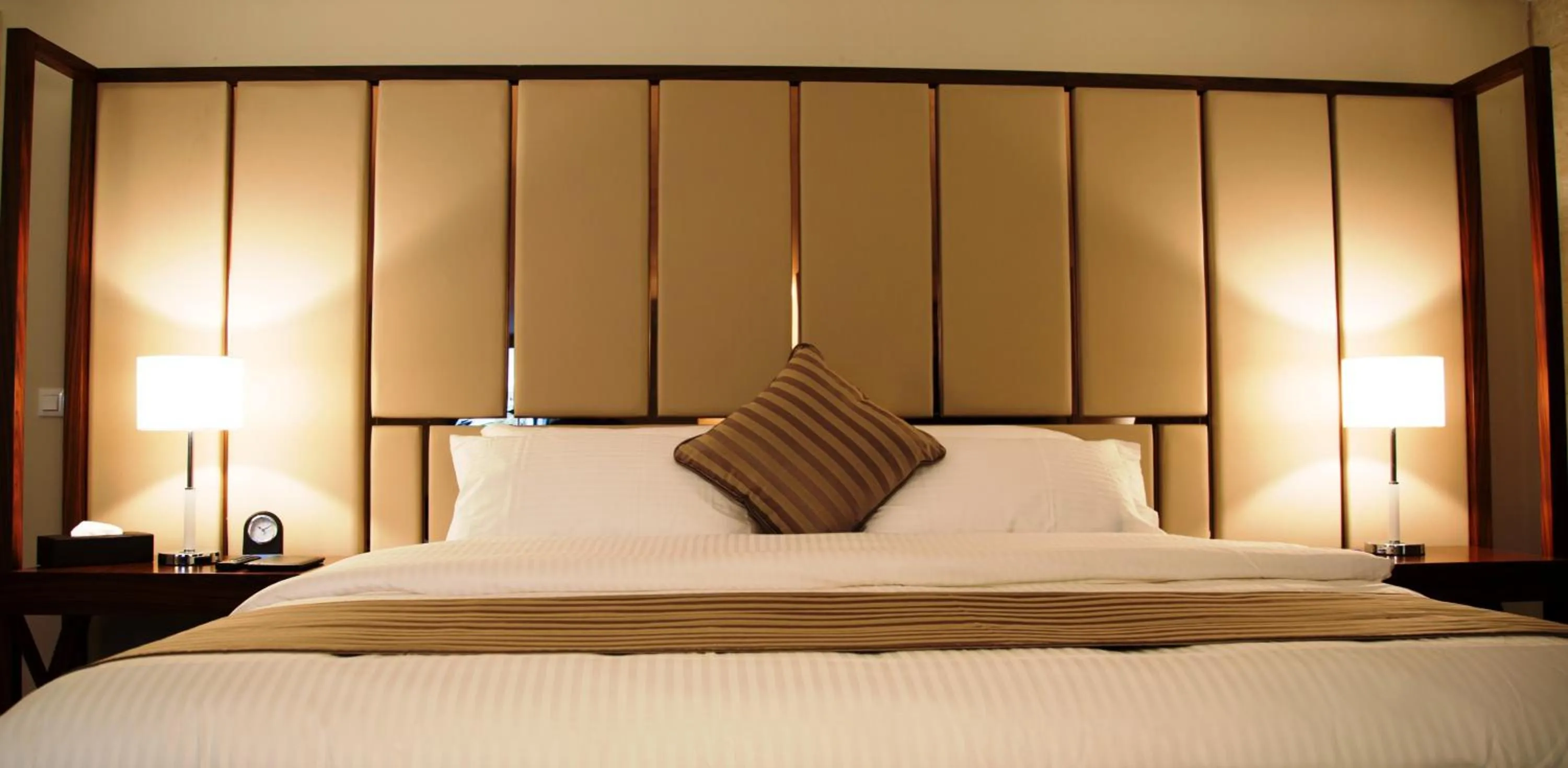 Bed in The Rooms Boutique Hotel