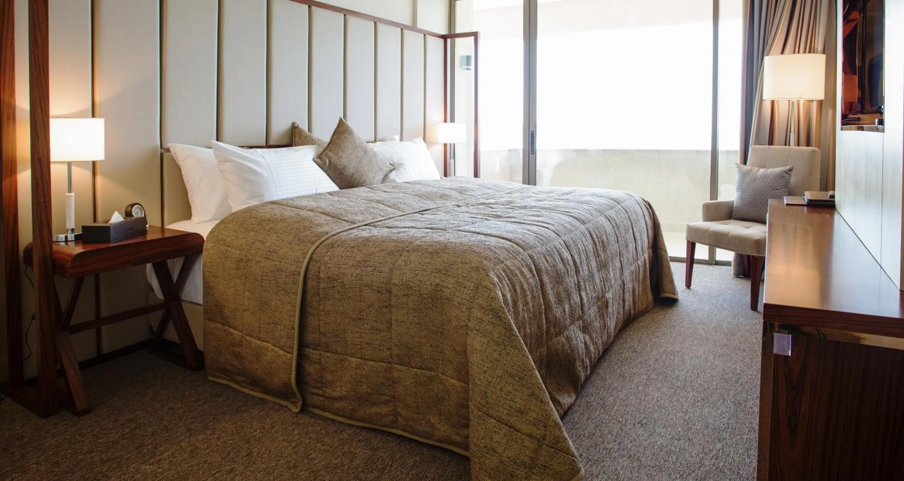 Bed in The Rooms Boutique Hotel