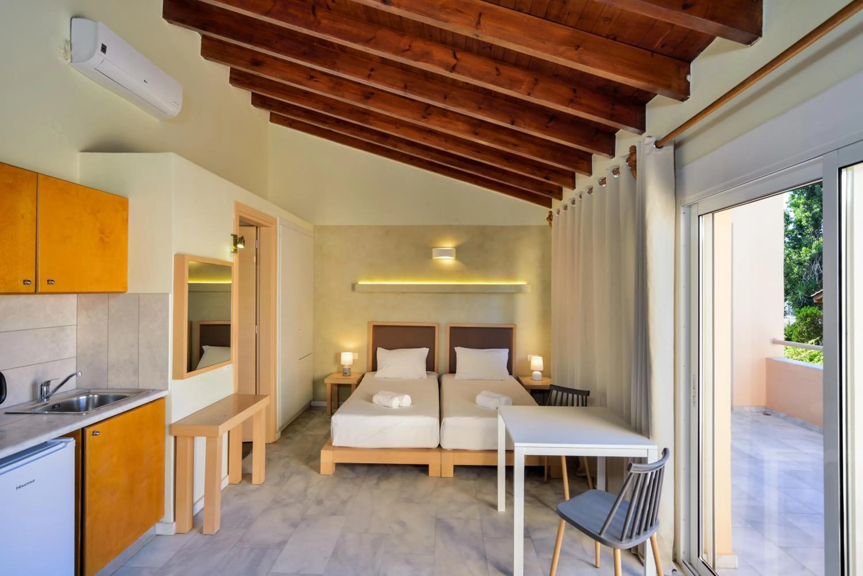 Bed in Elma's Dream Apartments & Villas