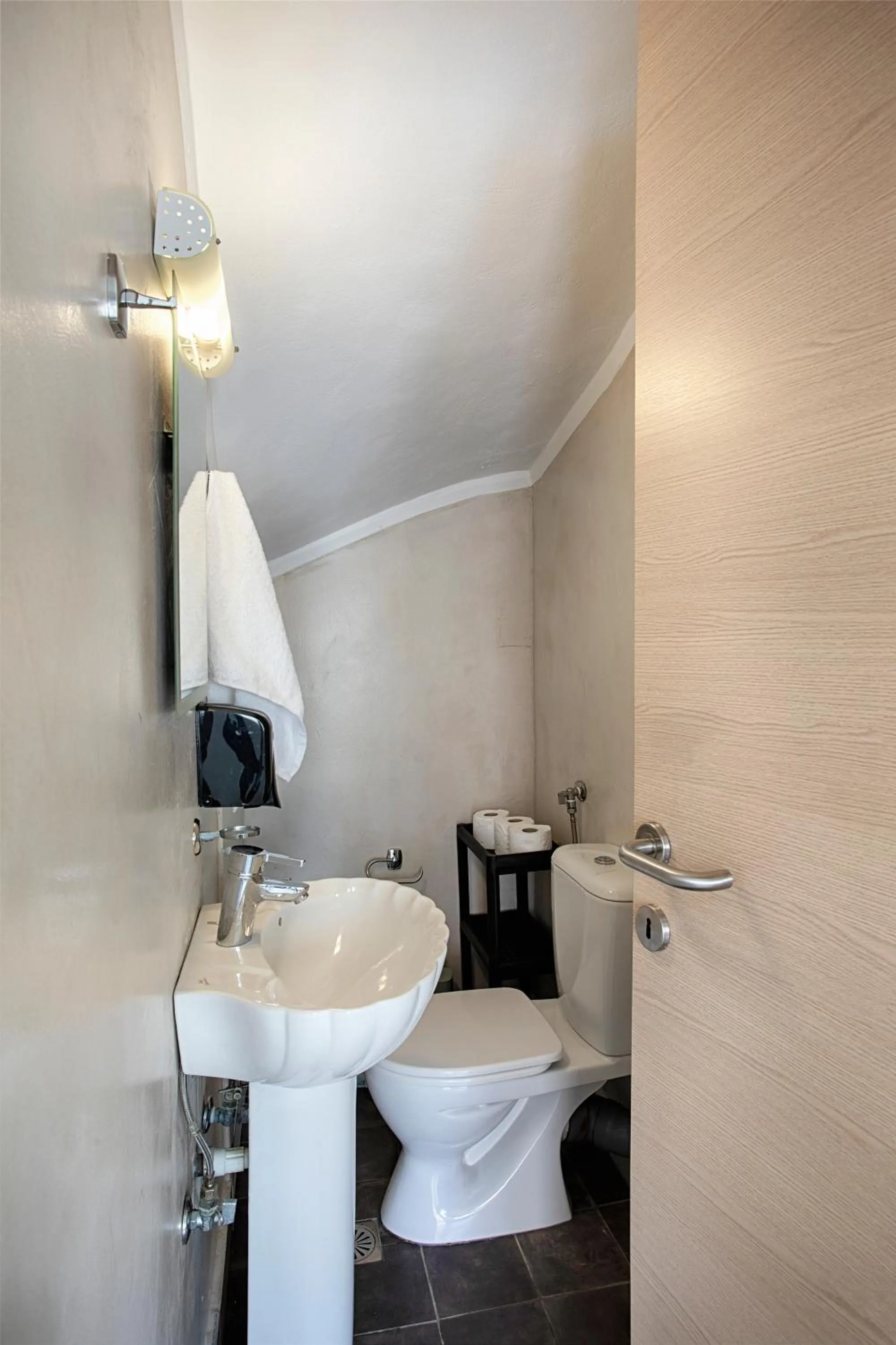 Toilet in Elma's Dream Apartments & Villas