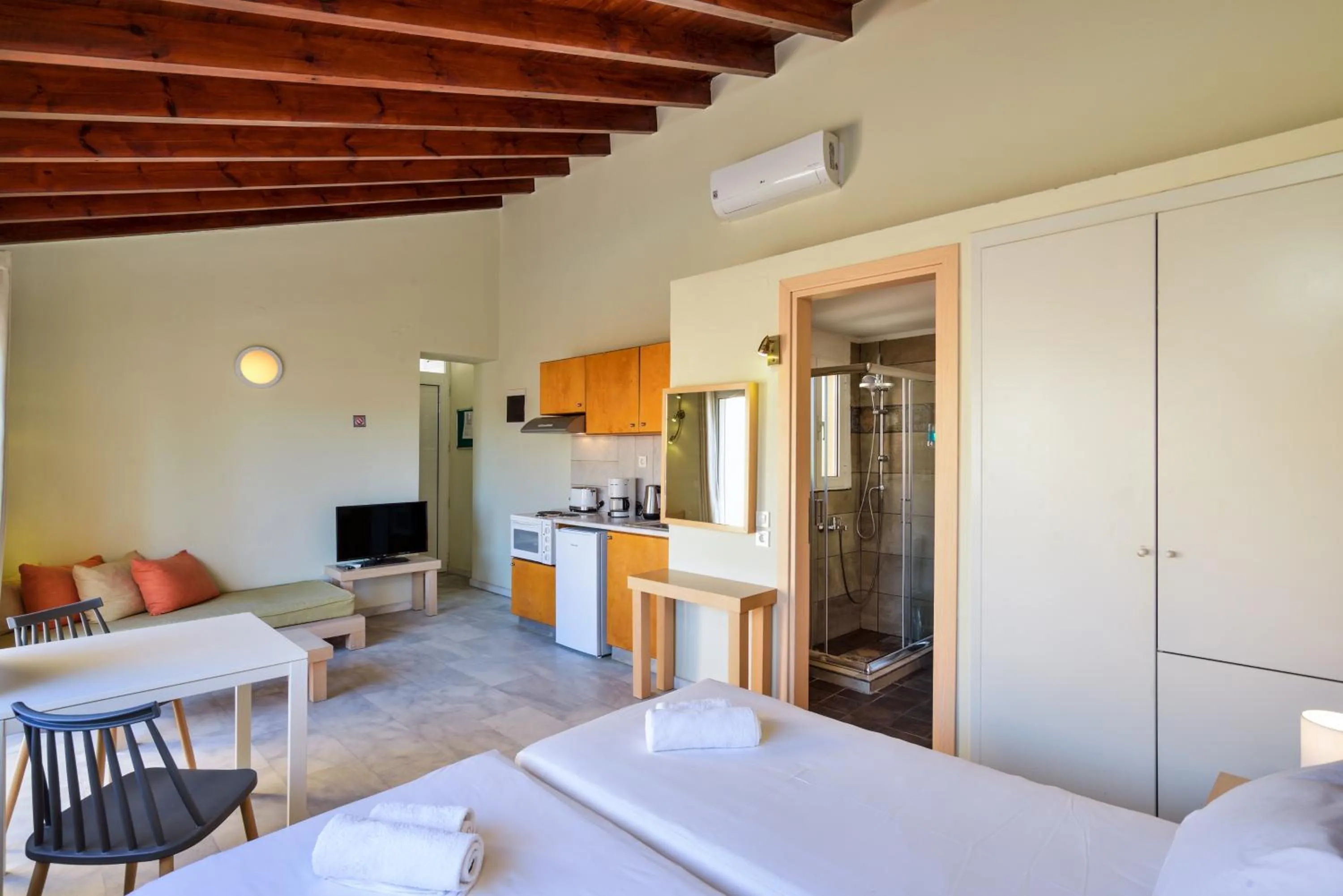 Bed in Elma's Dream Apartments & Villas