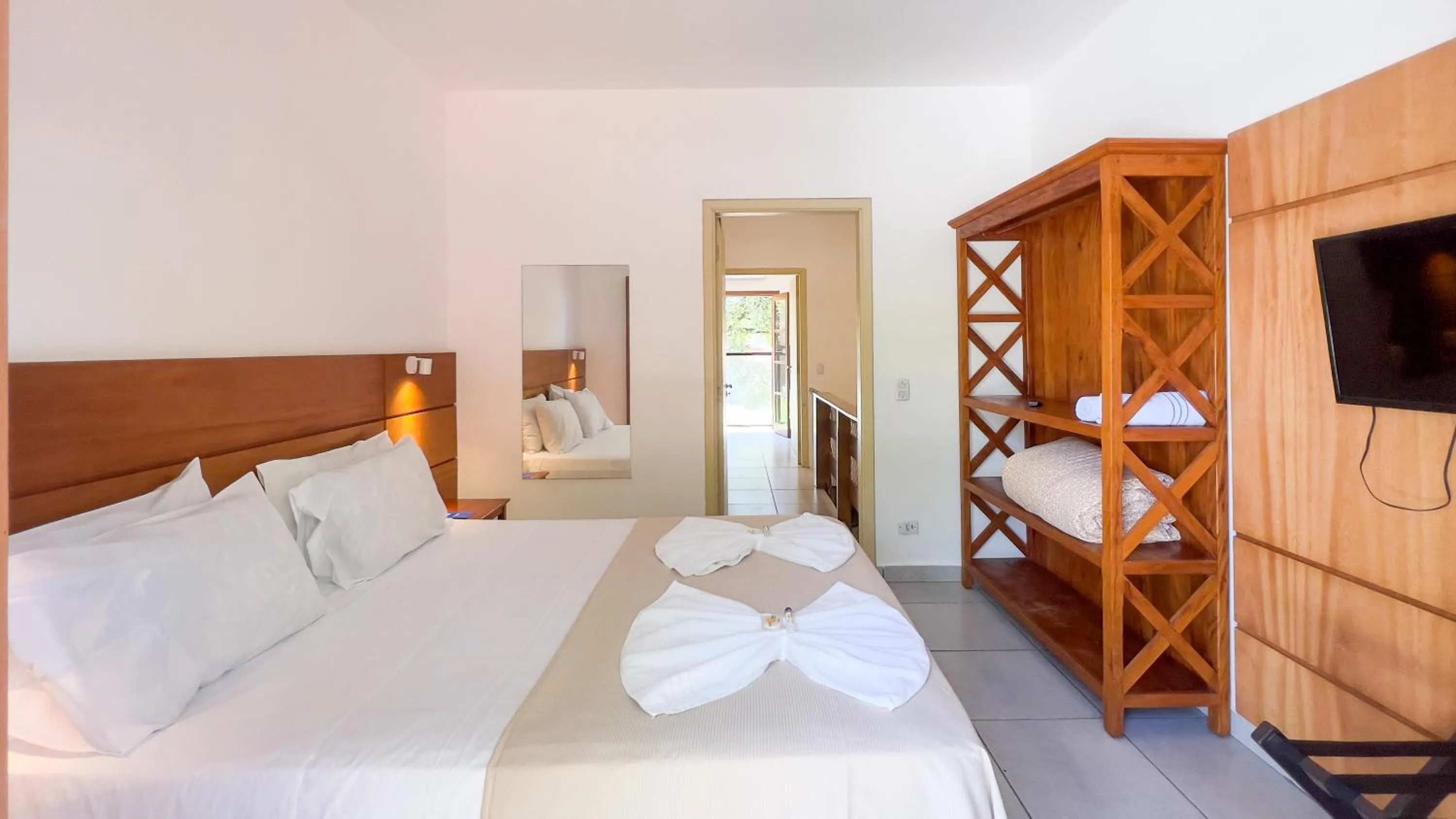 Bed in Pousada Ilha Vitoria