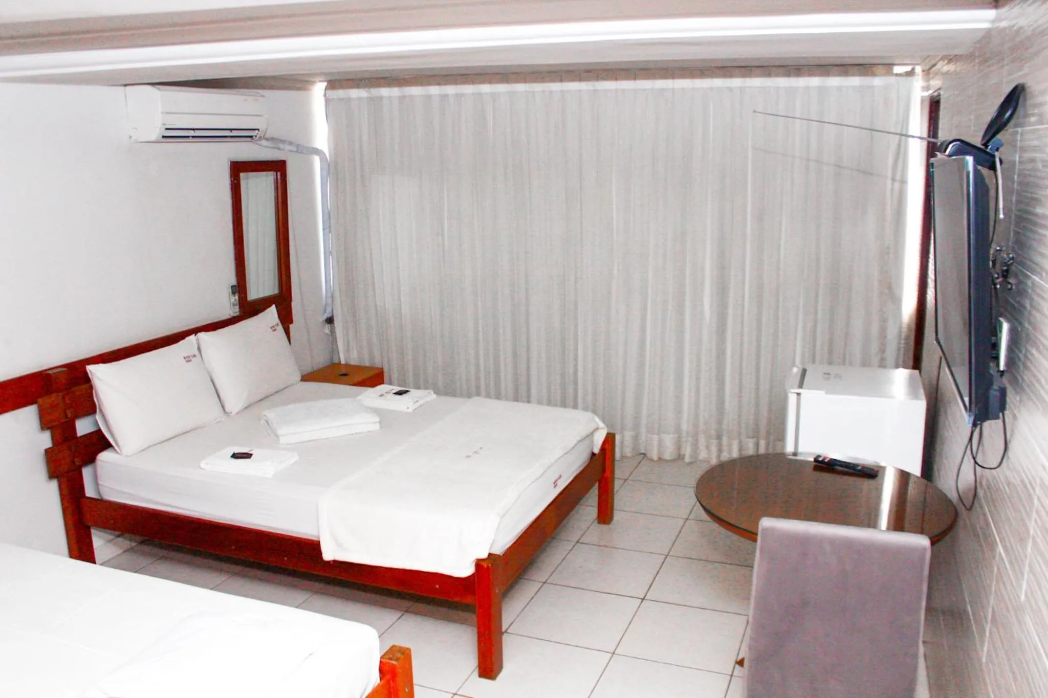 Bed in River Class Hotel