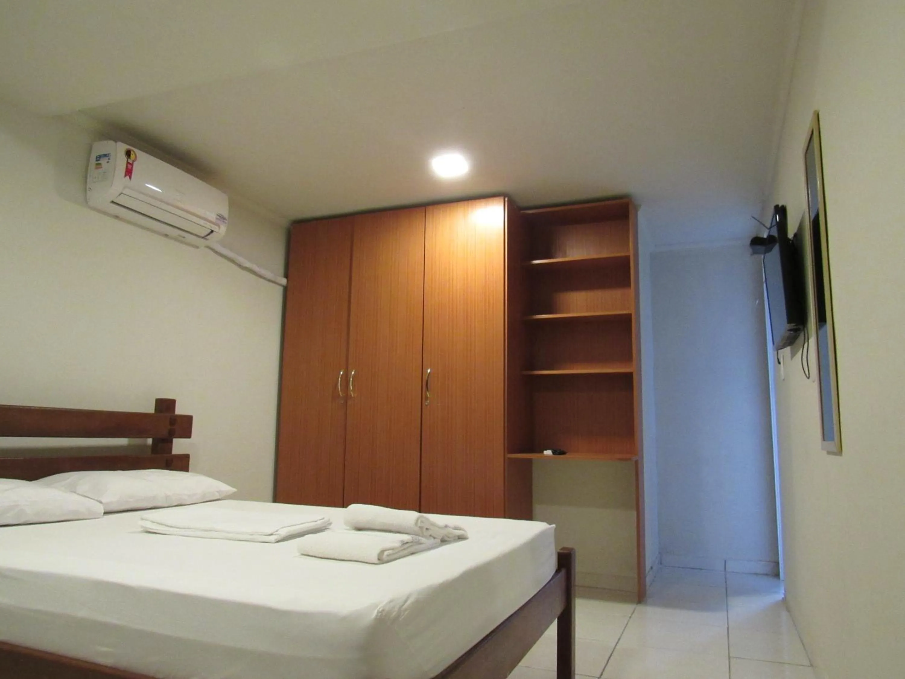 Bed in River Class Hotel