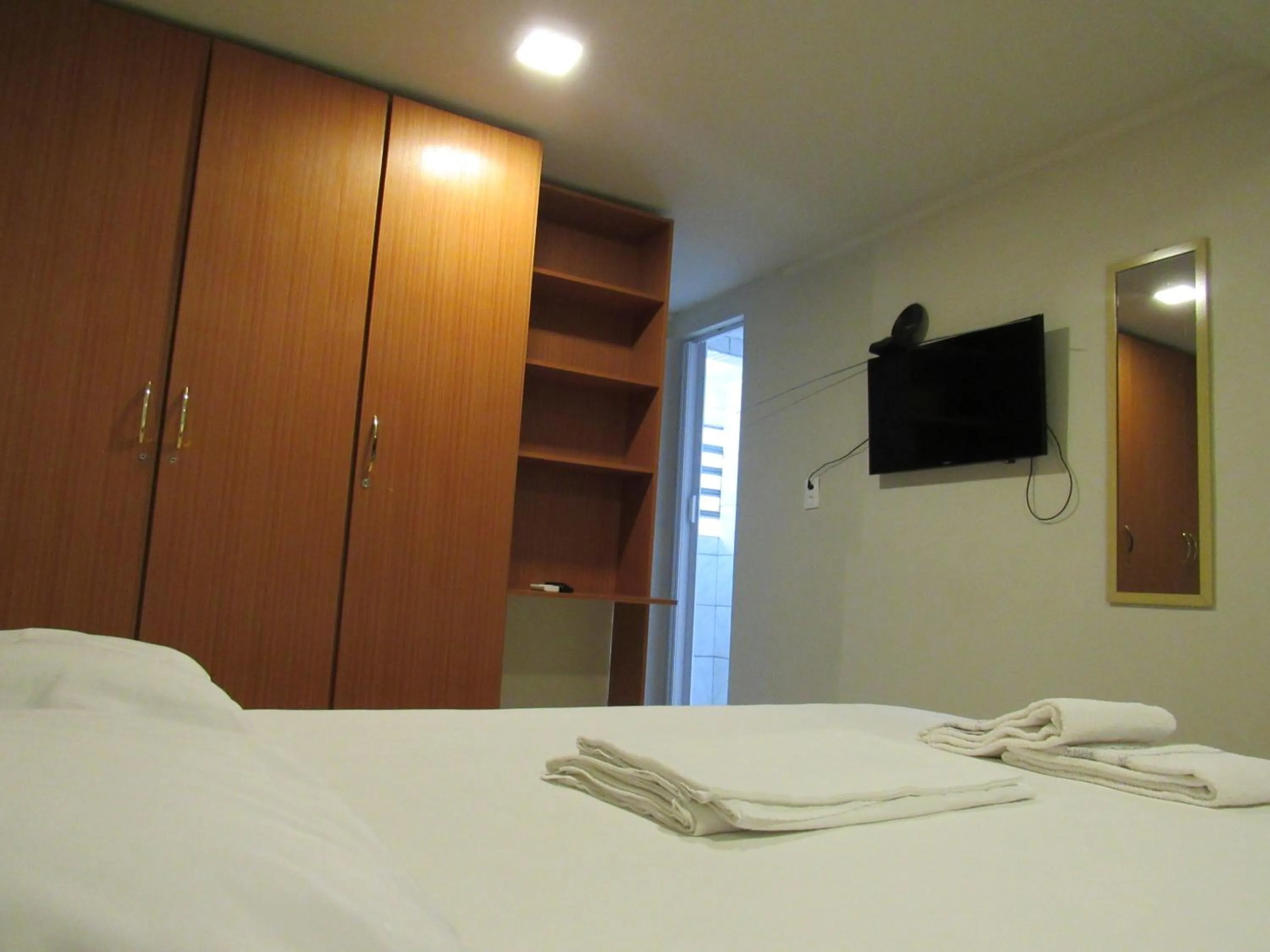 Bed in River Class Hotel