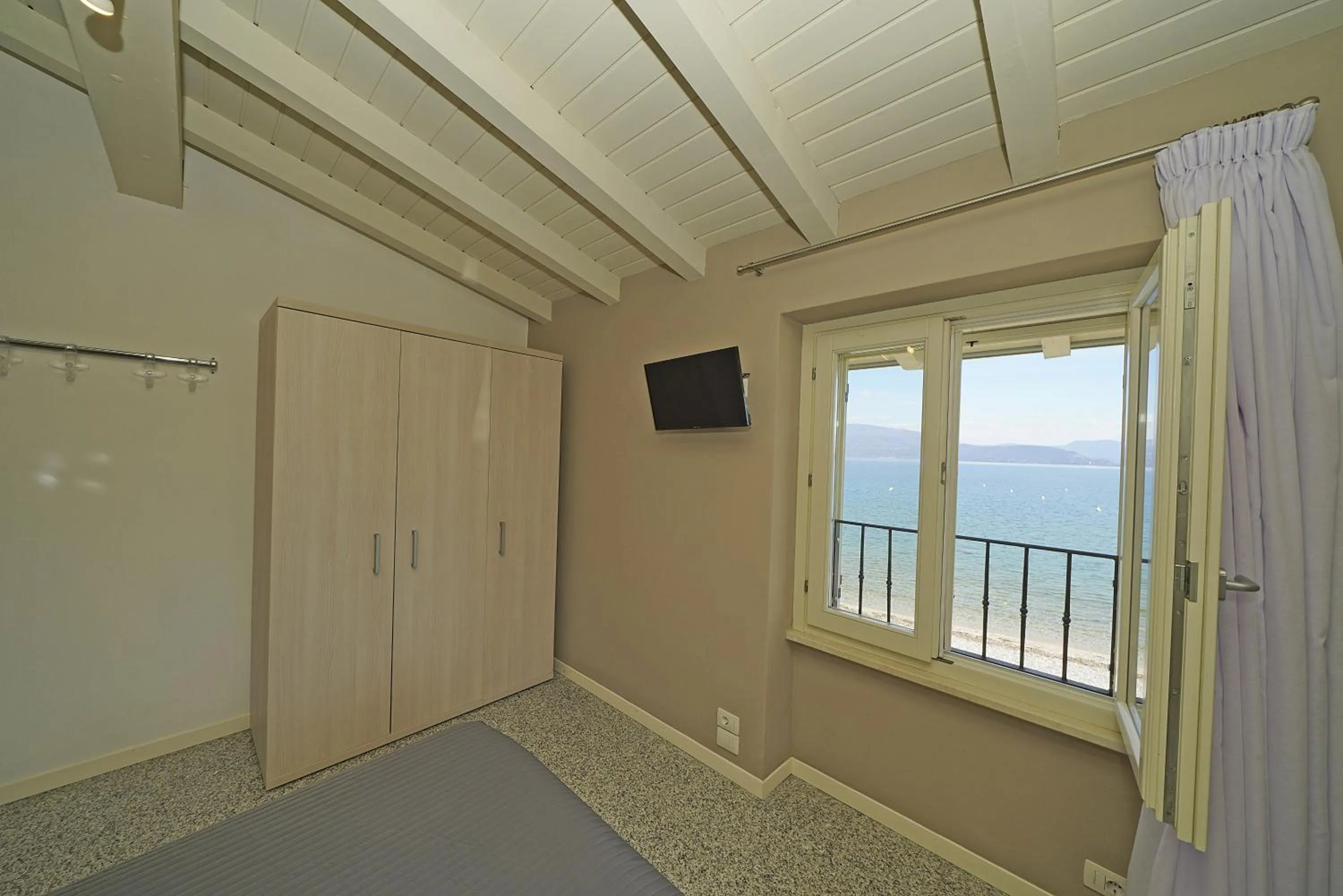 Bedroom in Onda Blu Resort