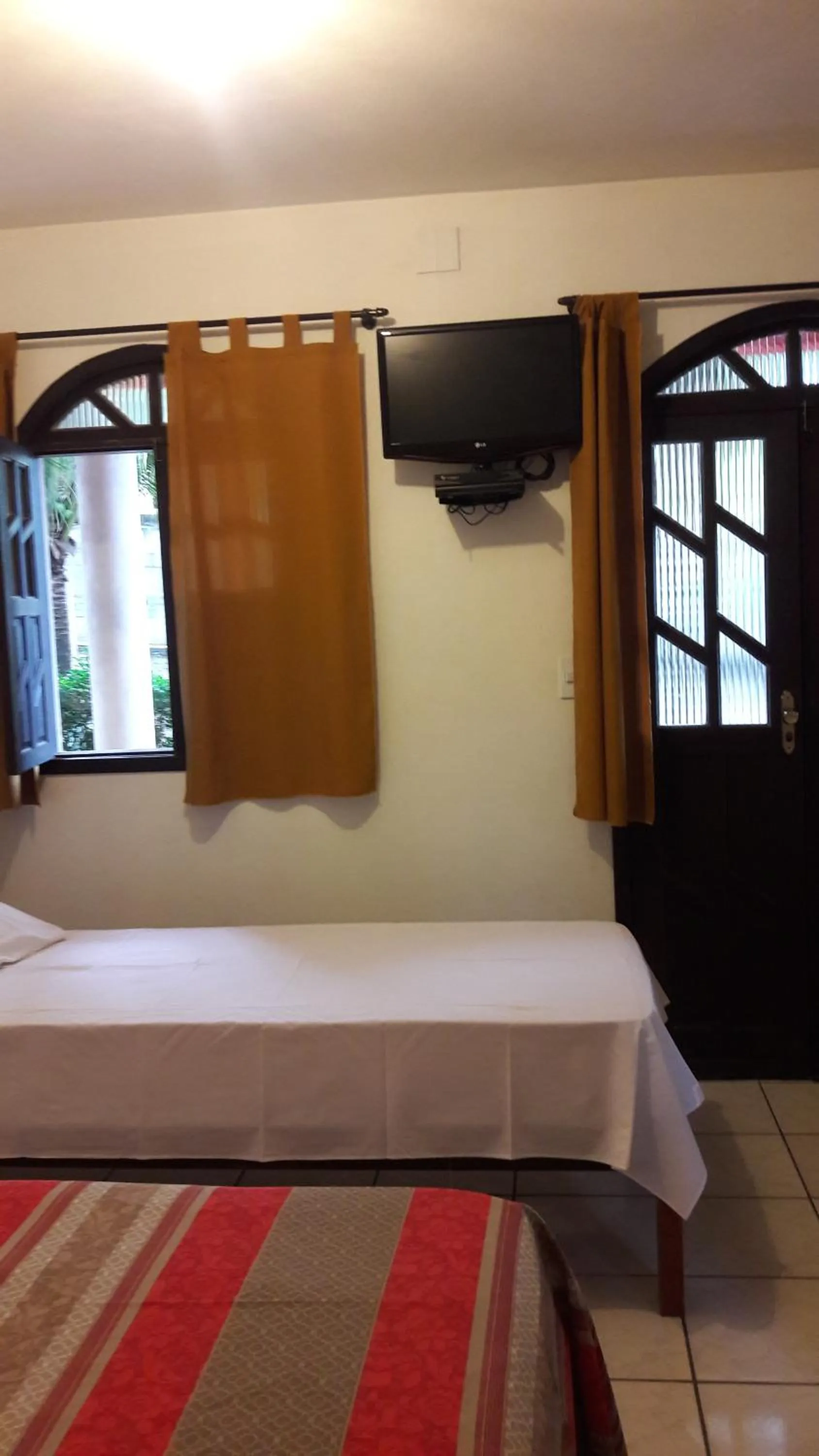 Photo of the whole room, Bed in Pousada Rio e Mar