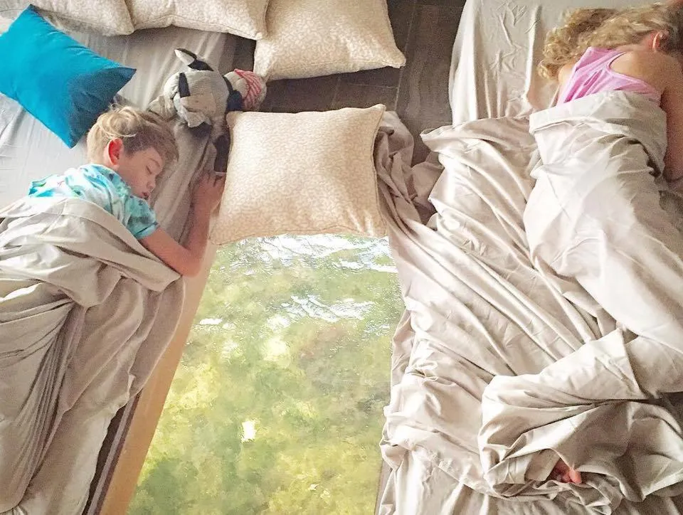 Bed in Lina Point Belize Overwater Resort