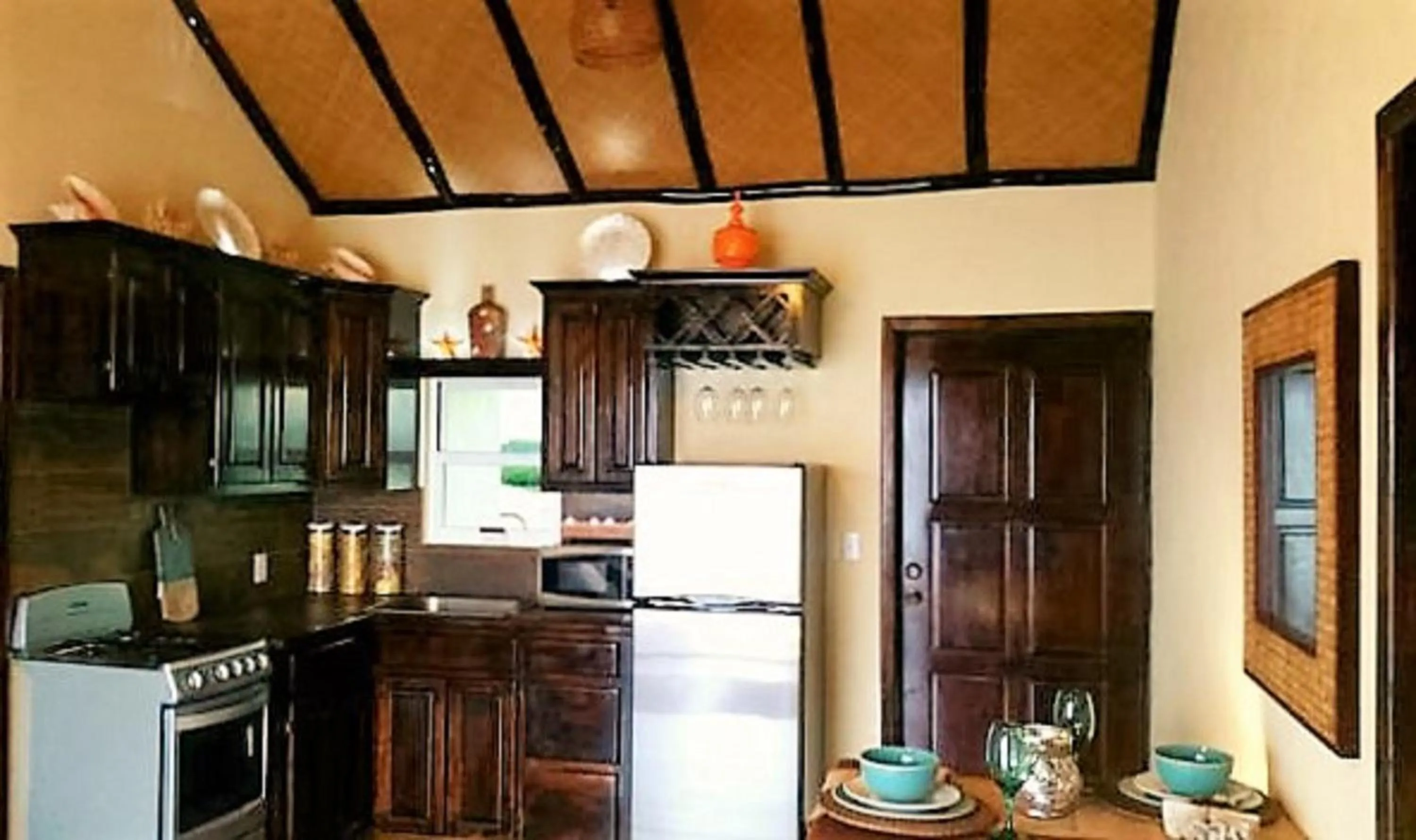 Kitchen or kitchenette in Lina Point Belize Overwater Resort