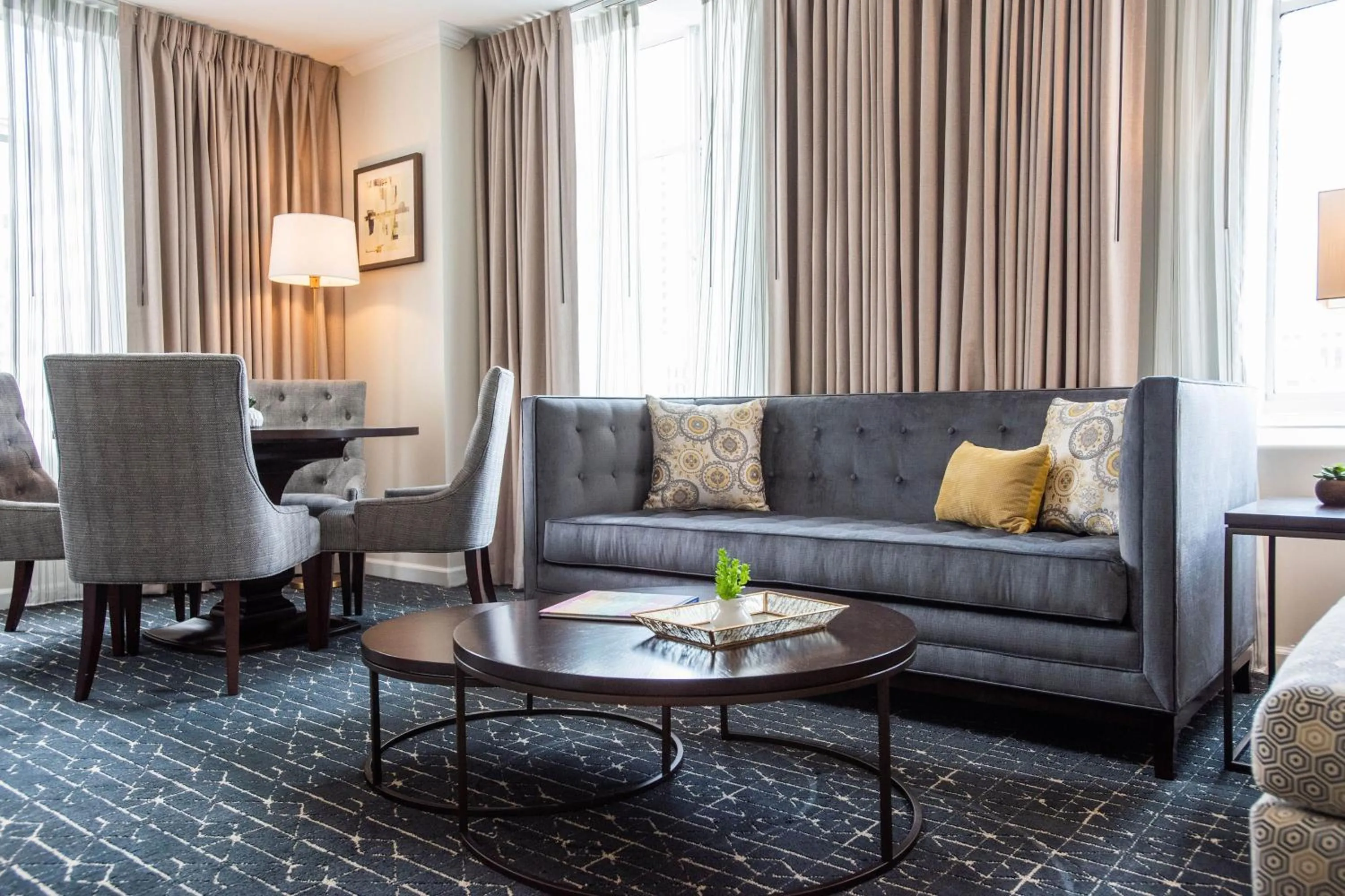 Living room in Magnolia Hotel Houston, a Tribute Portfolio Hotel