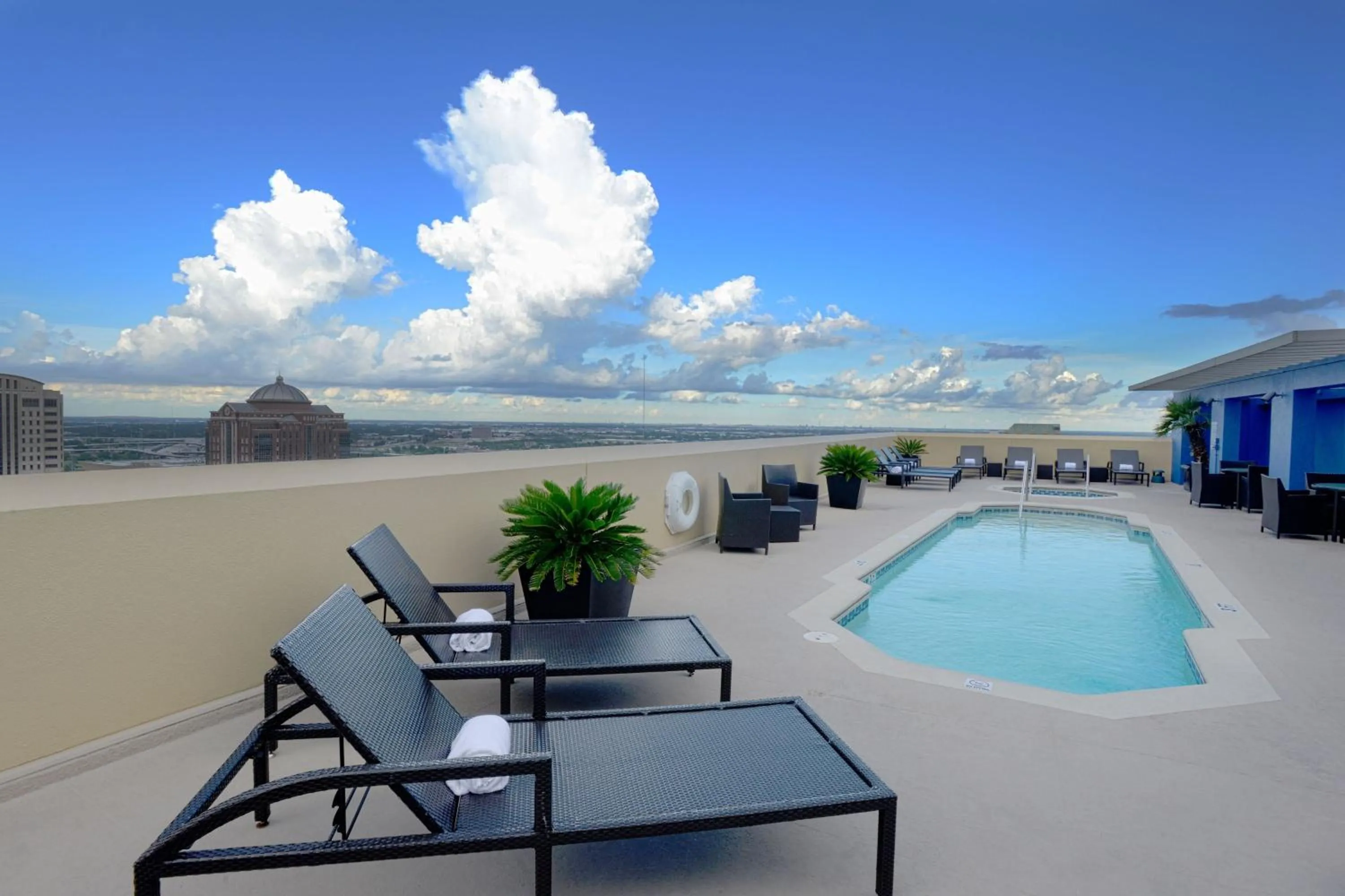 Swimming pool in Magnolia Hotel Houston, a Tribute Portfolio Hotel