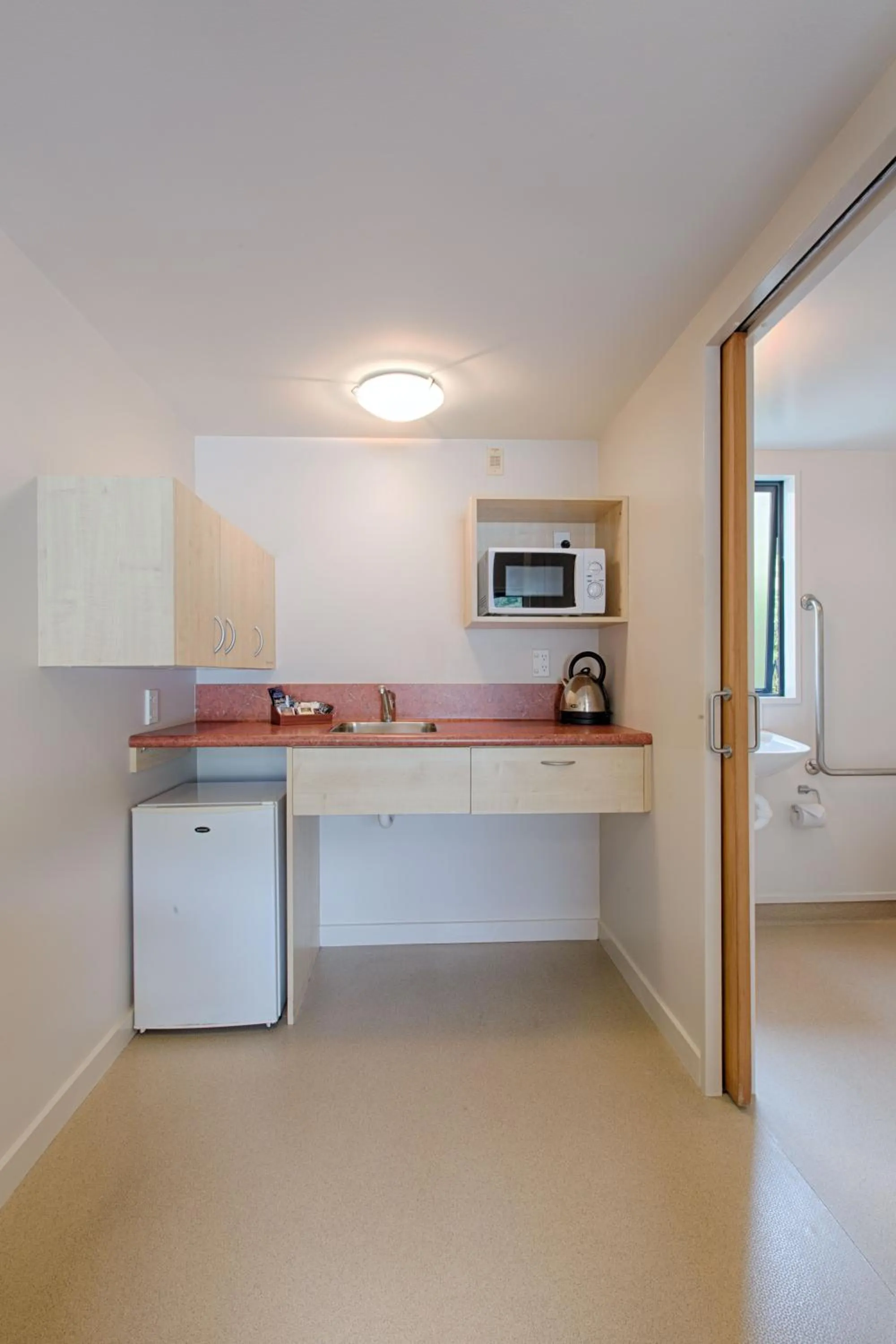 Kitchen or kitchenette in Bella Vista Motel Franz Josef Glacier