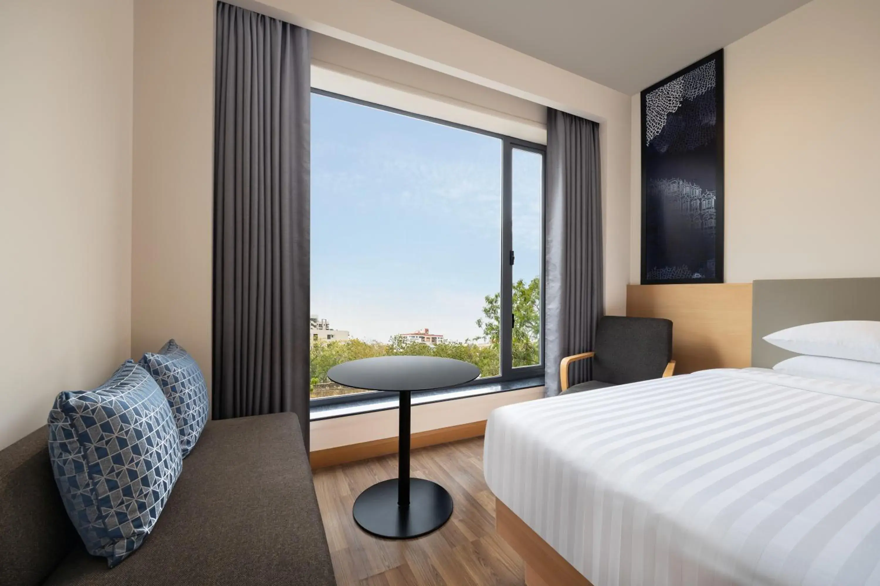 Guest Room King Bed City View - single occupancy in Fairfield by Marriott Jaipur Guest Room King Bed City View - single occupancy in Fairfield by Marriott Jaipur