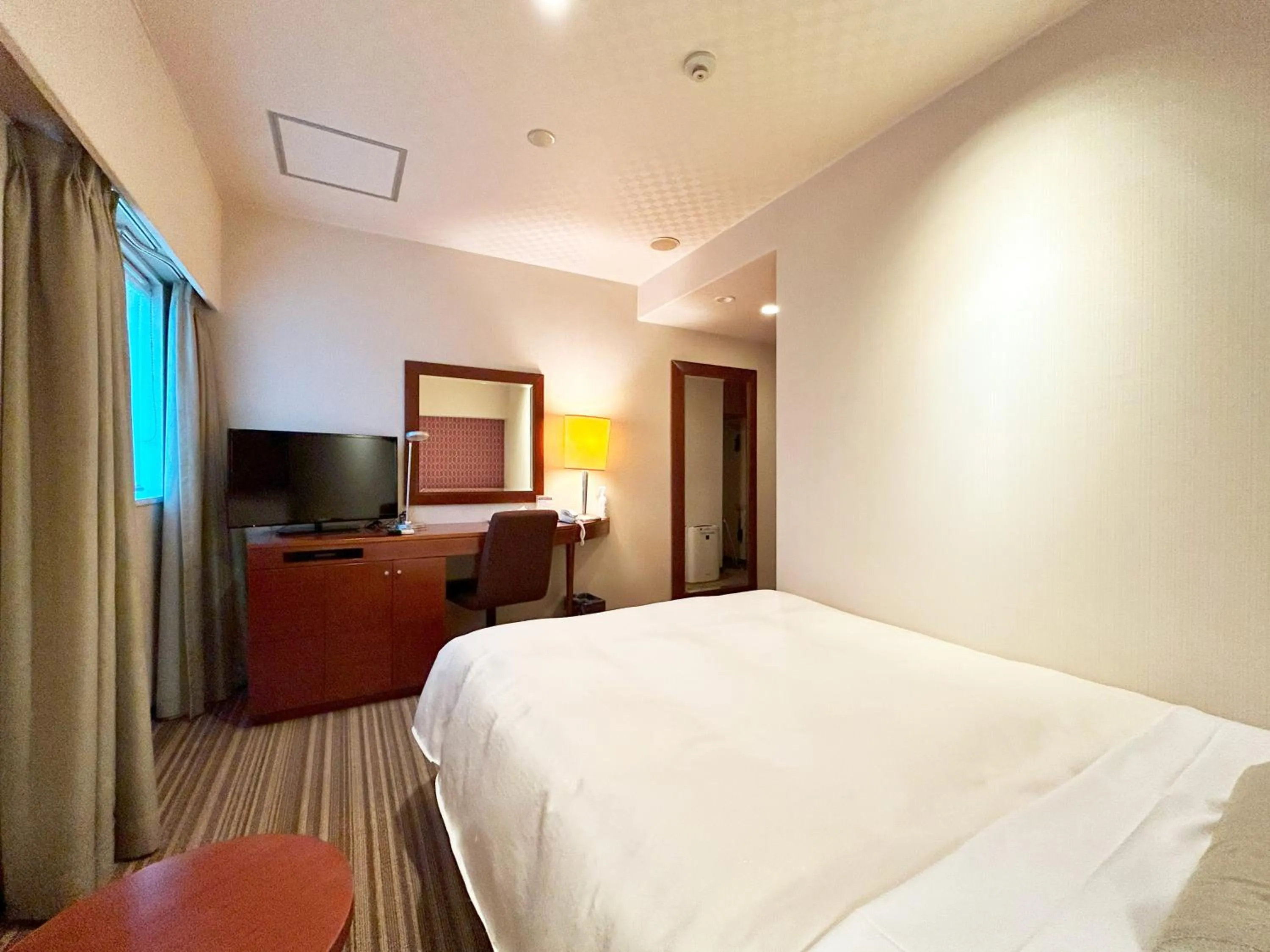 Bed in Nakajimaya Grand Hotel