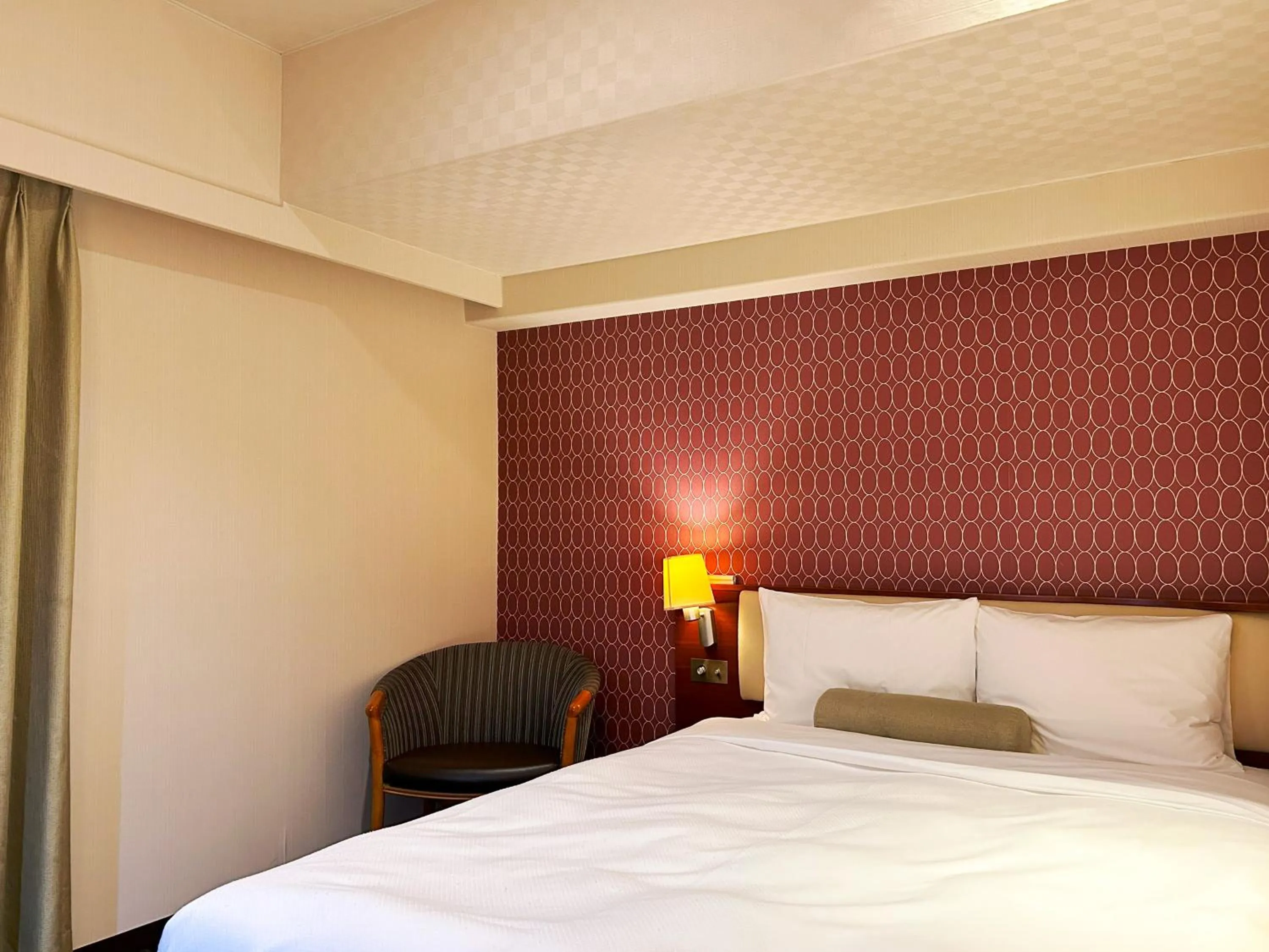 Bed in Nakajimaya Grand Hotel