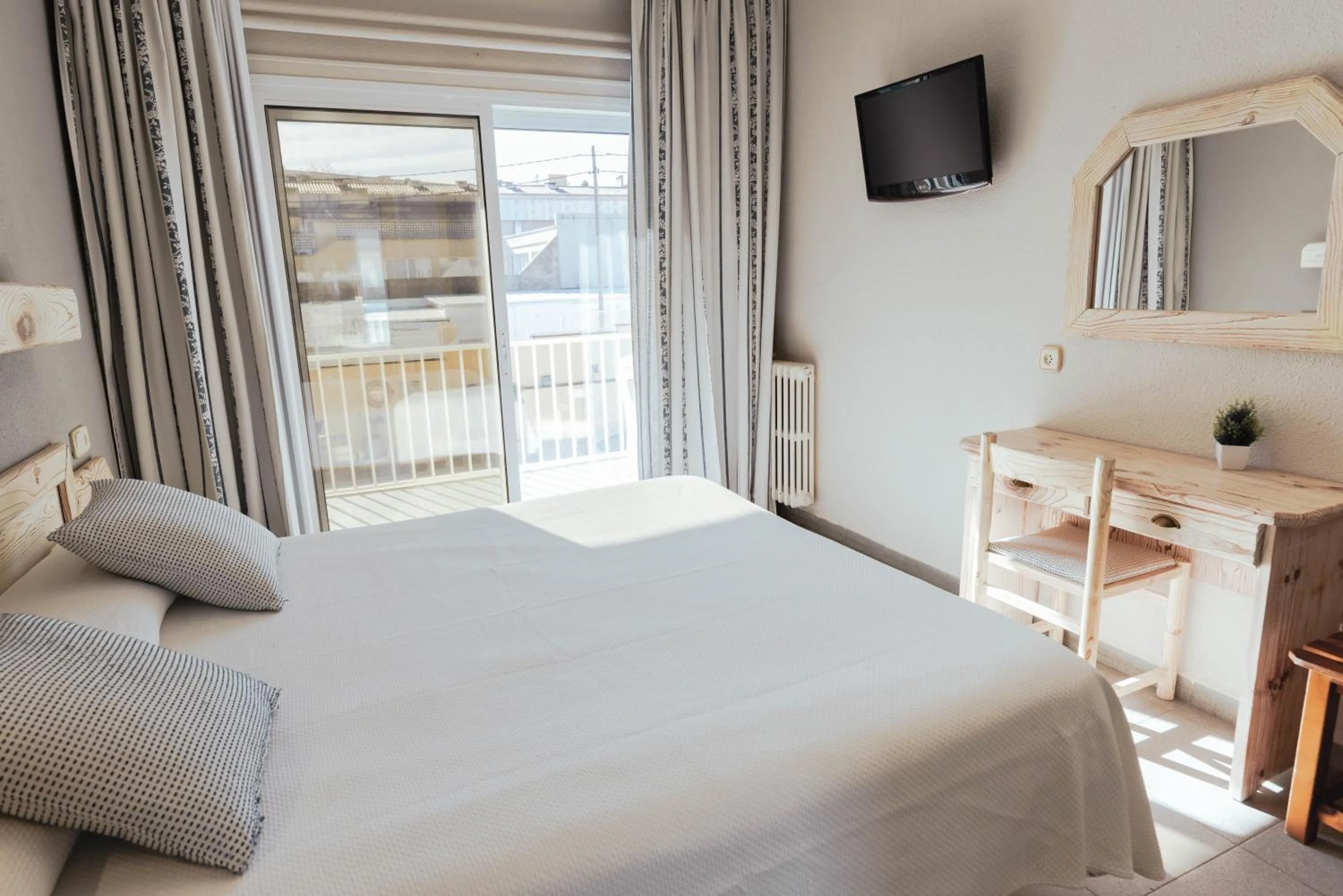 Bed in Hotel S'Agoita