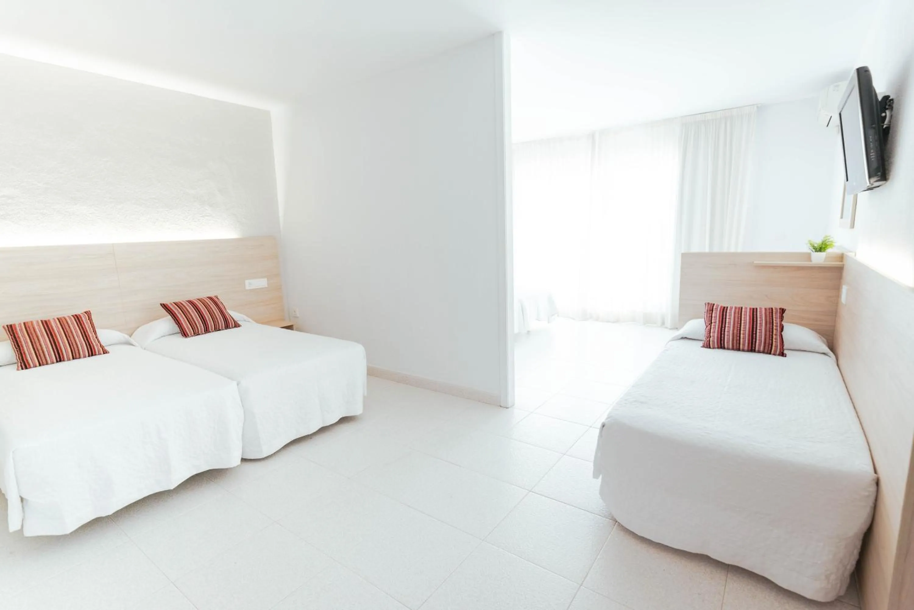 Bed in Hotel S'Agoita