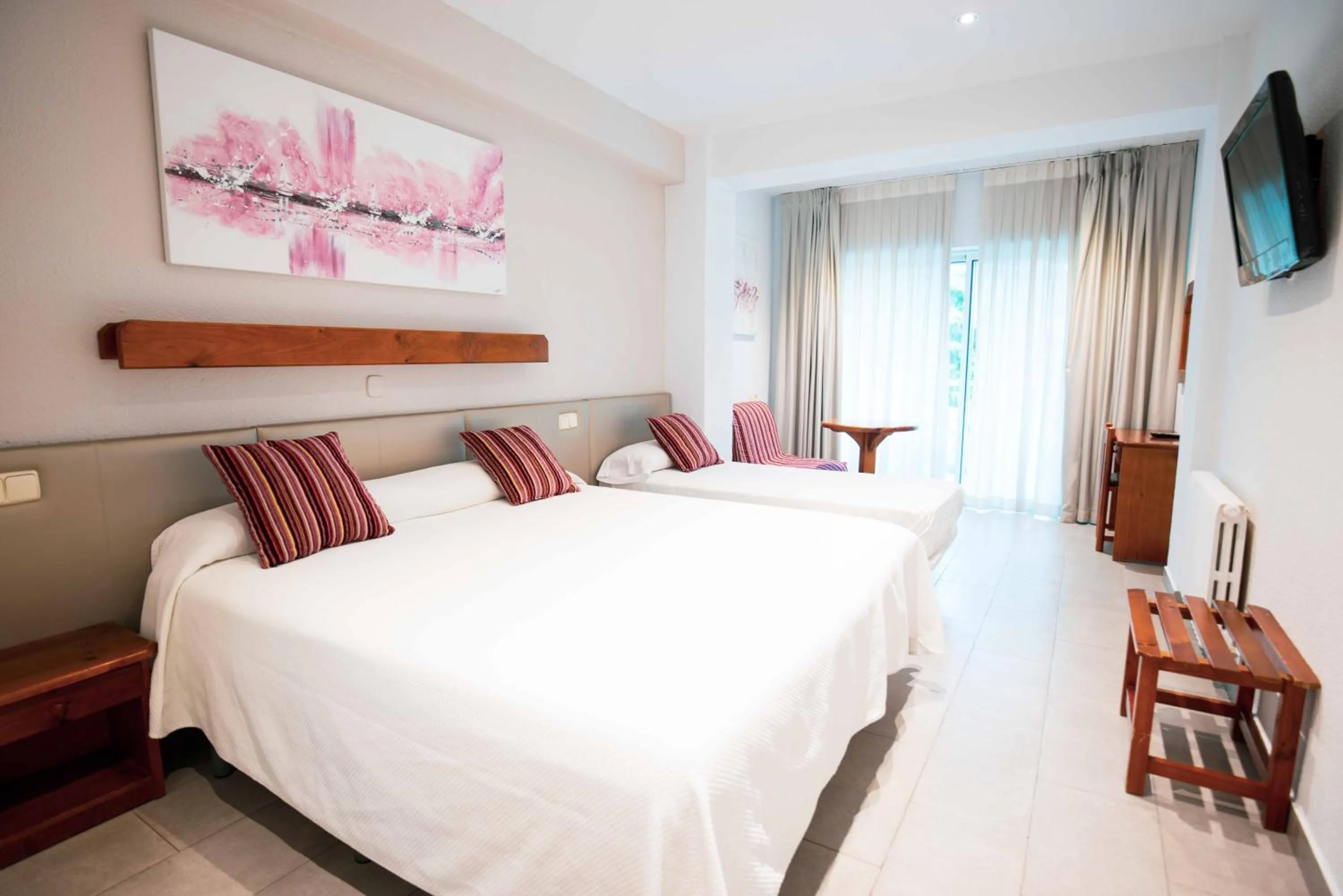 Bed in Hotel S'Agoita