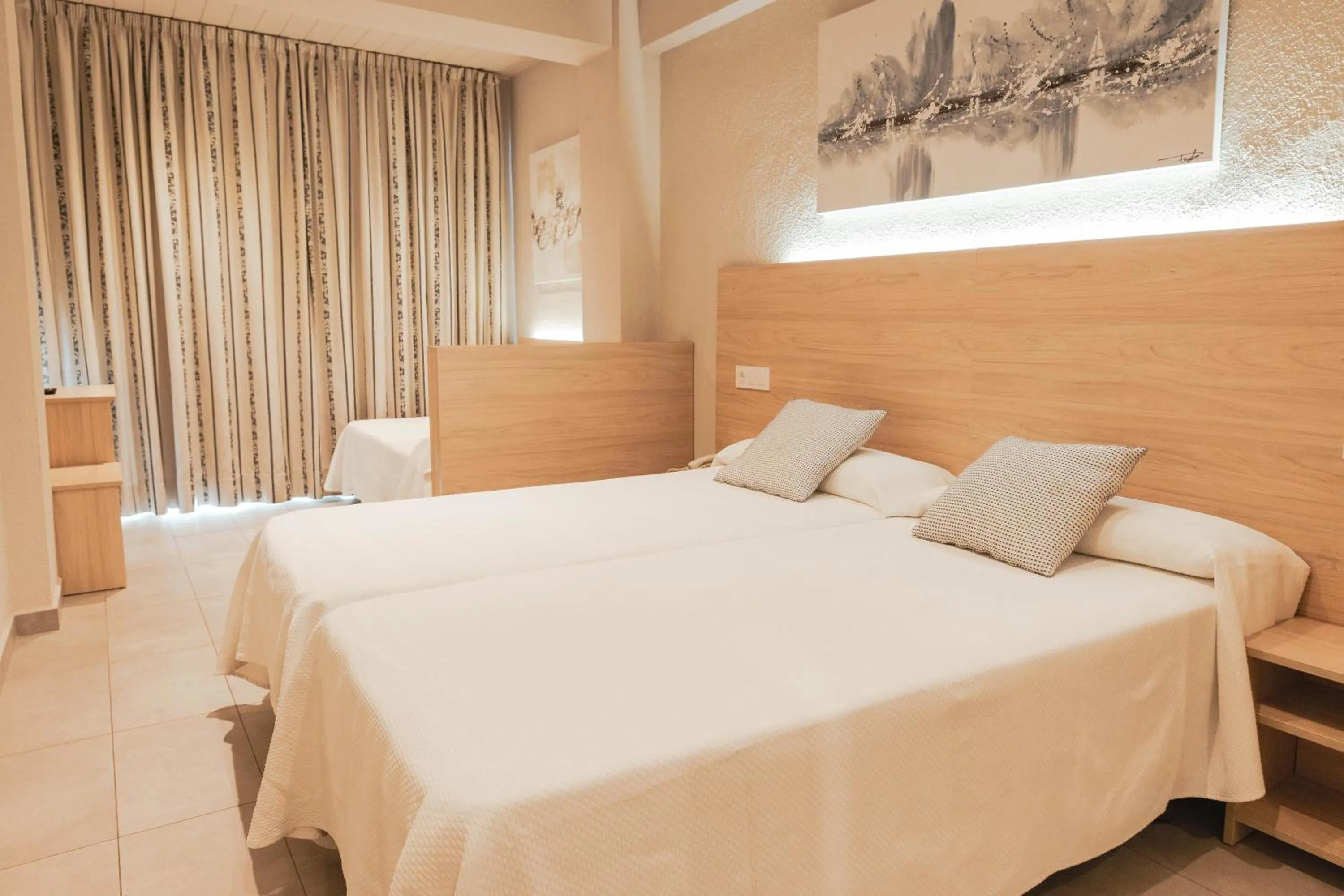 Bed in Hotel S'Agoita