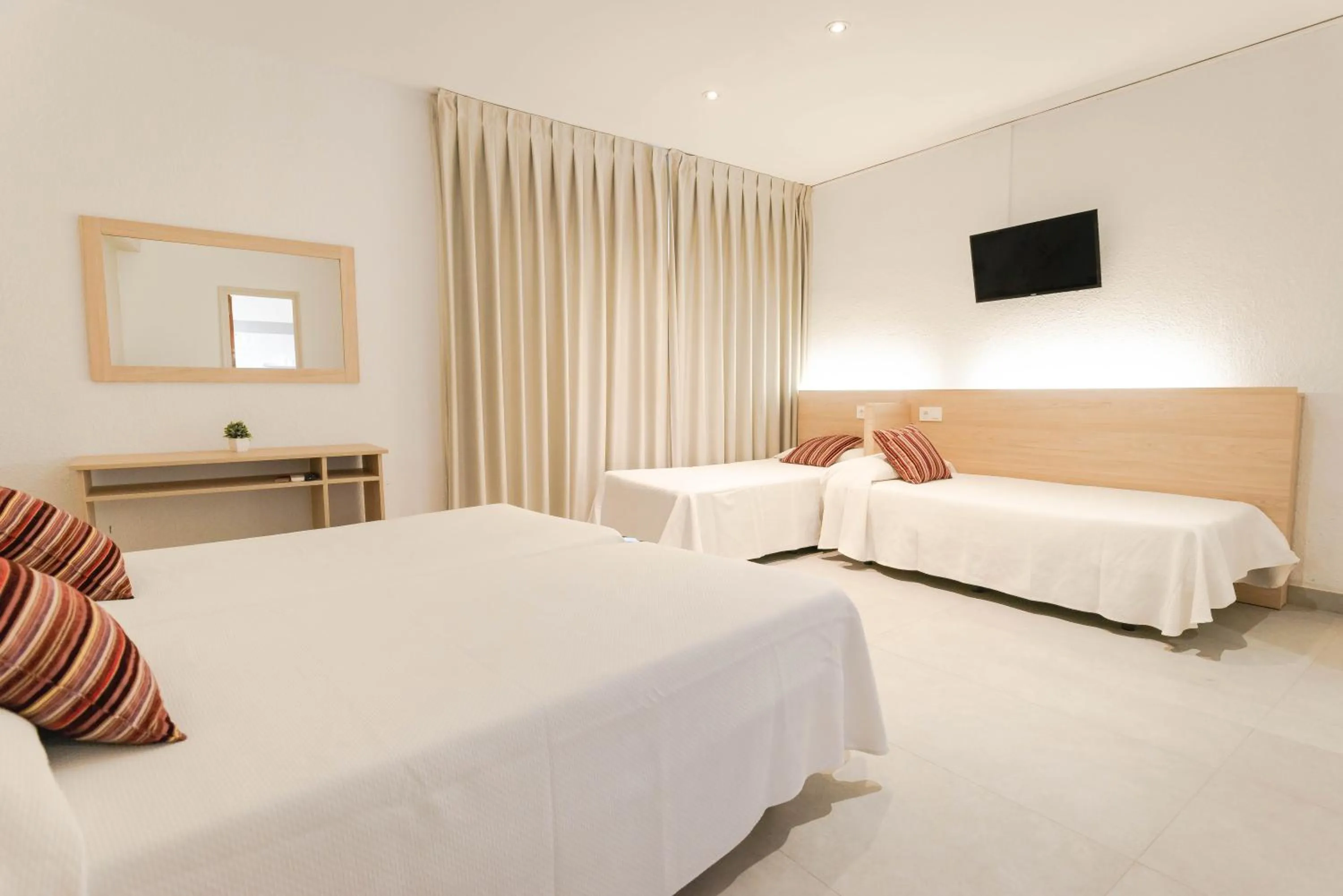 Bed in Hotel S'Agoita