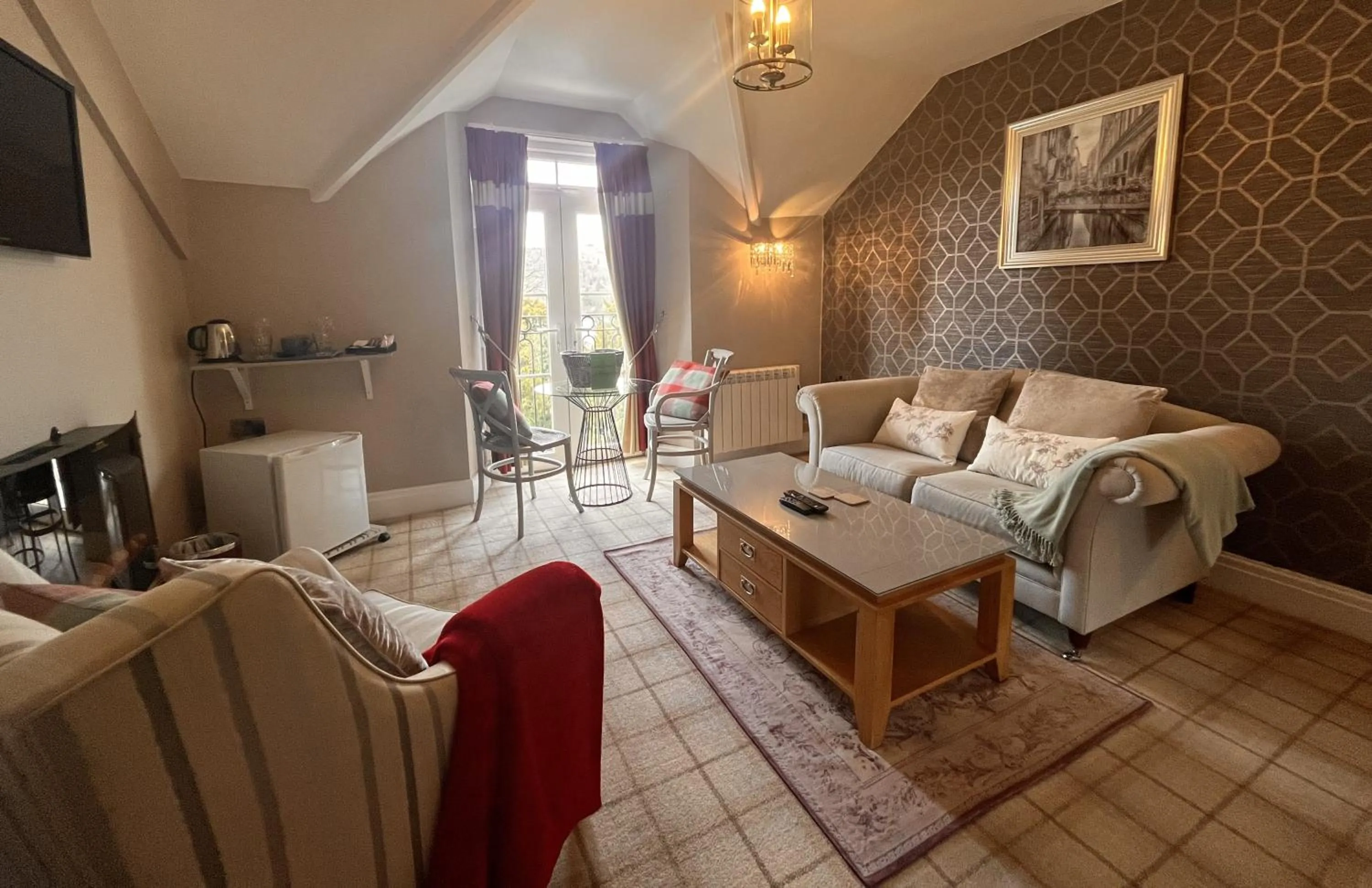 Bed in Bowness Bay Suites