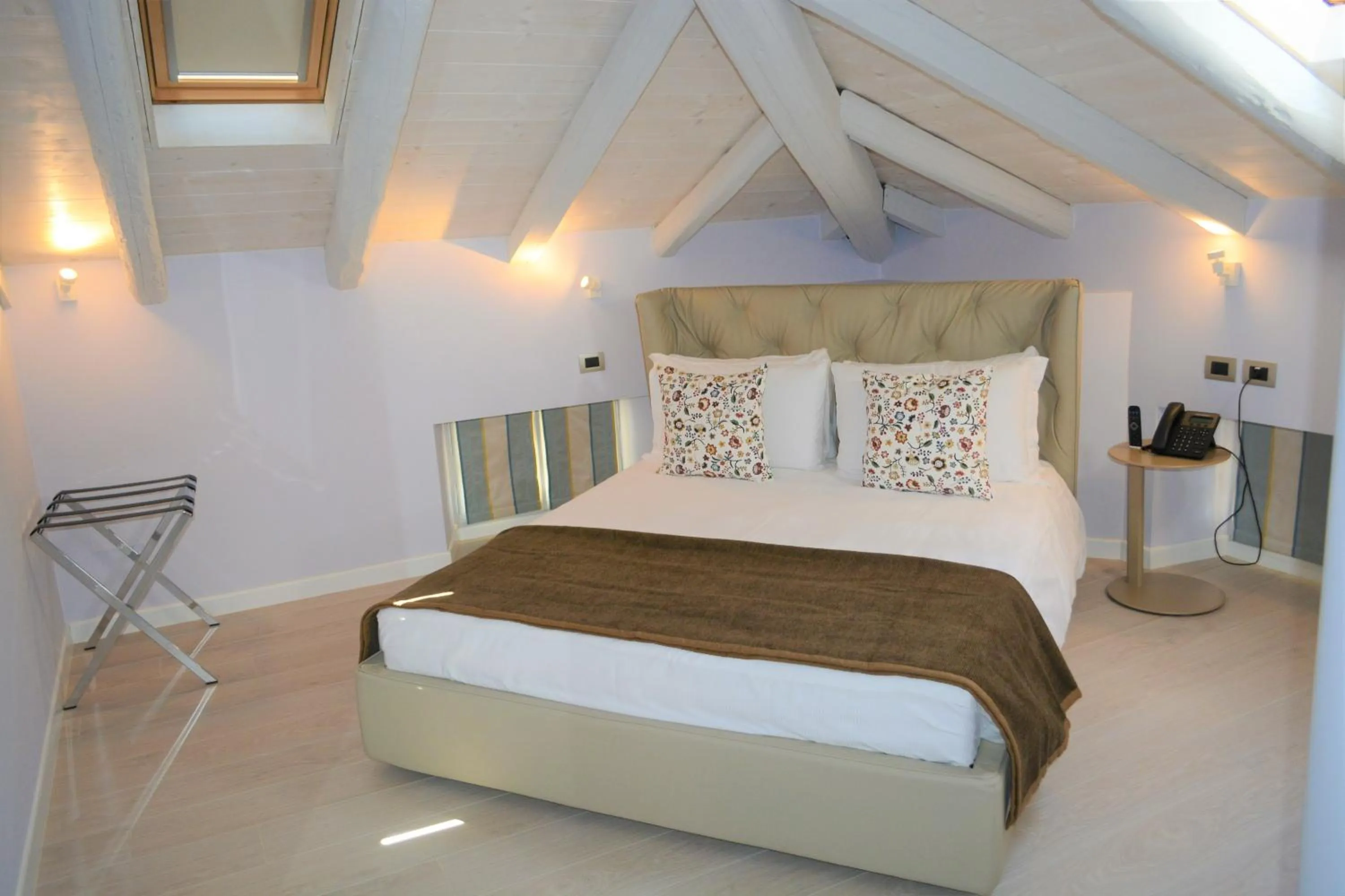 Bed in Les 7 Suites Erica