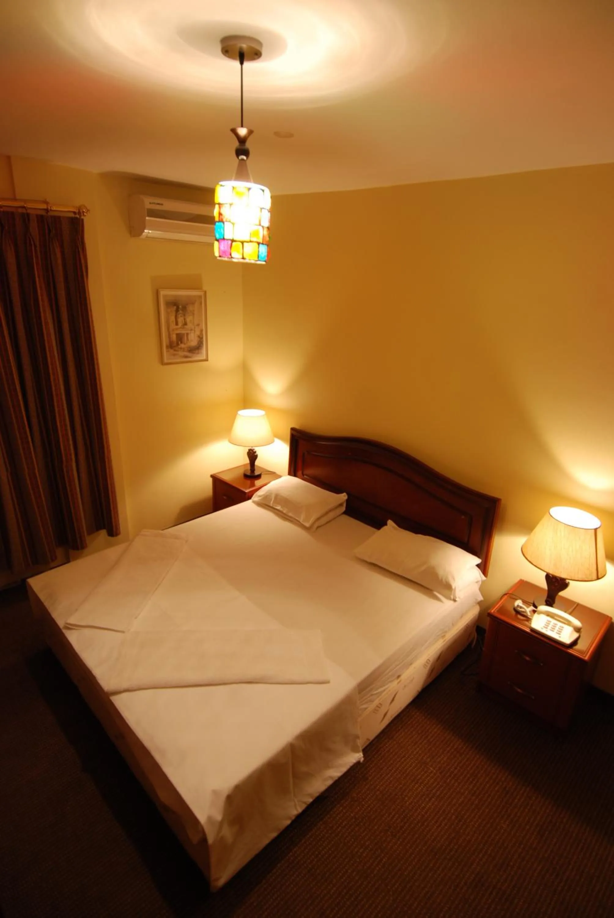 Bed in Al Rashid Hotel