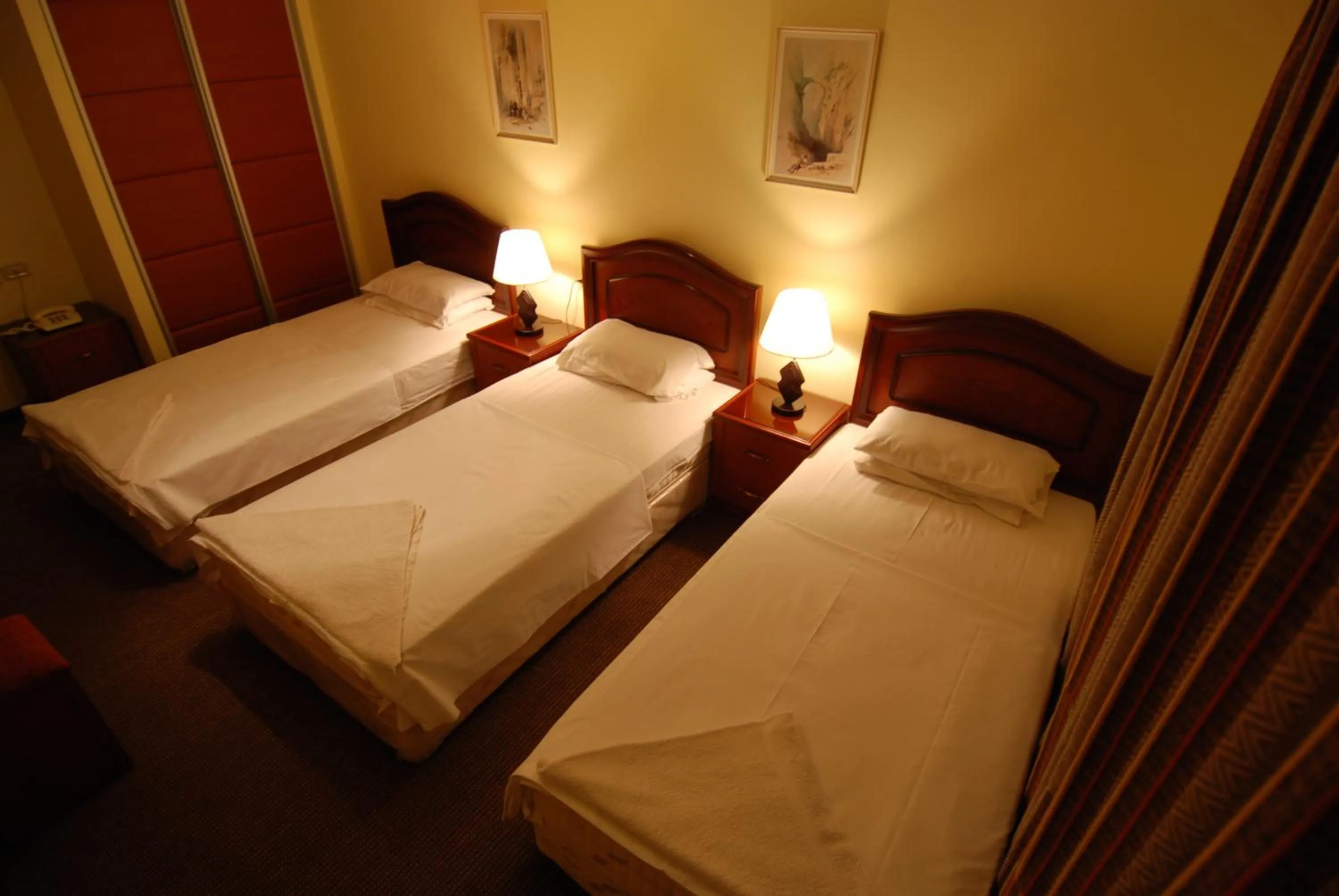 Bed in Al Rashid Hotel