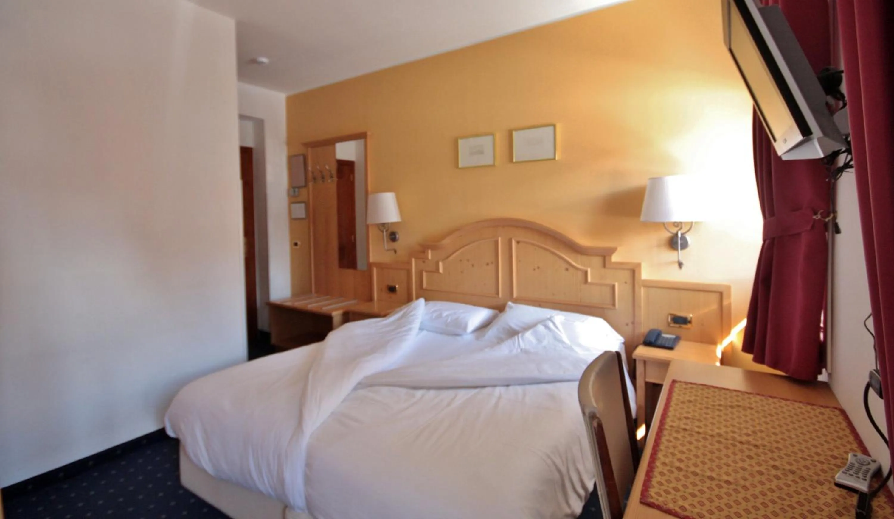 Bed in Hotel La Meridiana